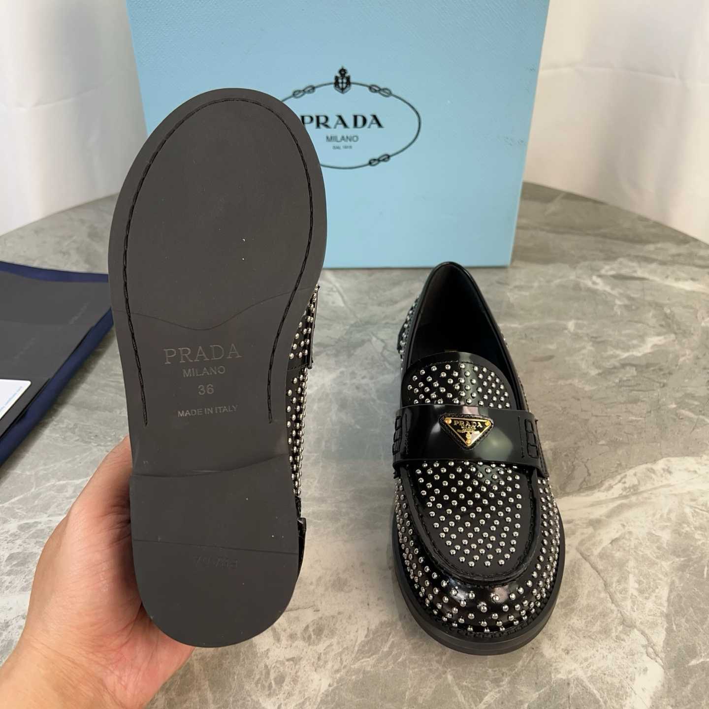 Prada Studded Brushed Leather Loafers - FashionPlug