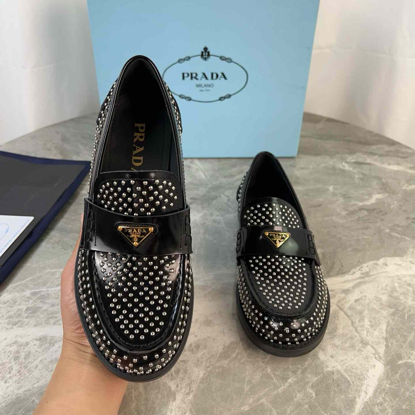 Prada Studded Brushed Leather Loafers - FashionPlug