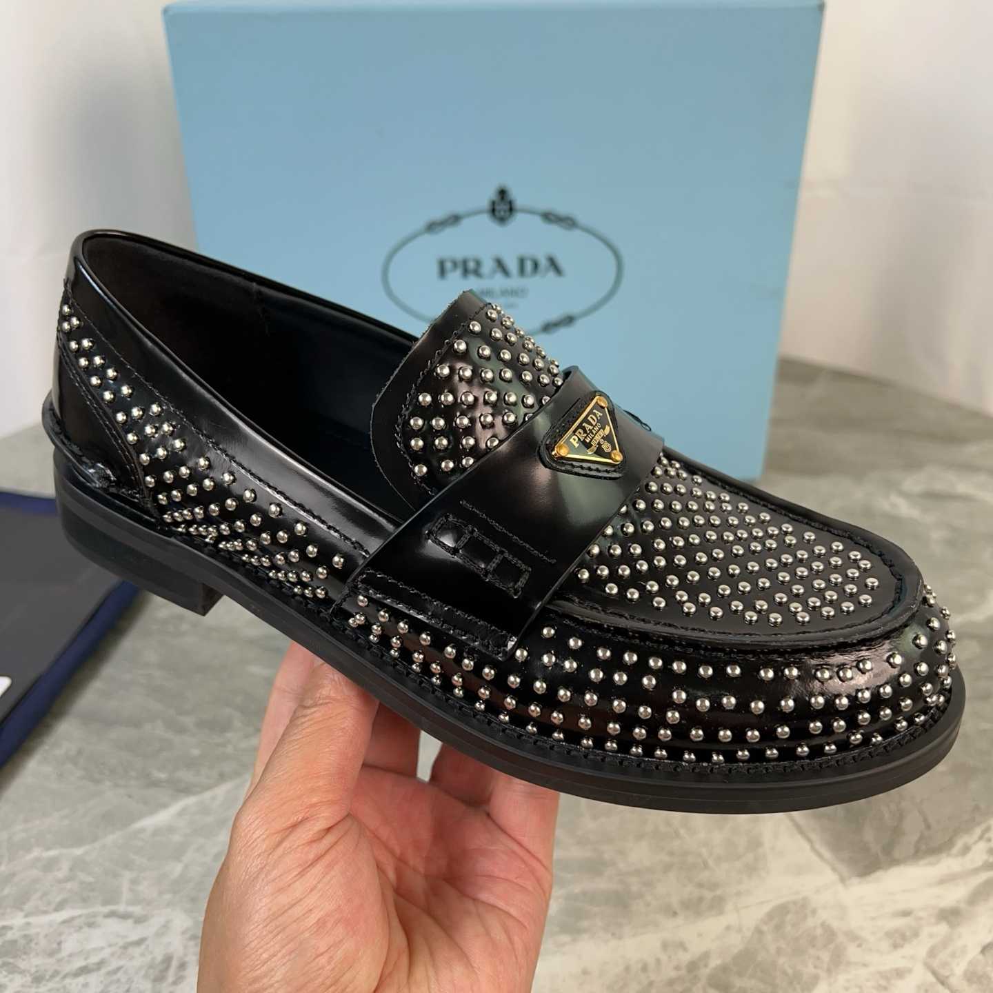Prada Studded Brushed Leather Loafers - FashionPlug