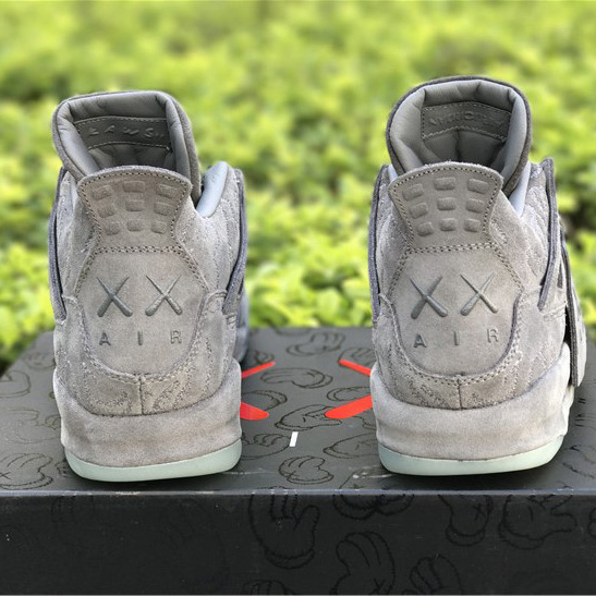 KAWS x Air Jordan 4 “Cool Grey”      - FashionPlug