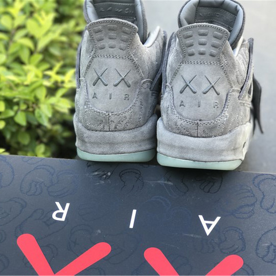 KAWS x Air Jordan 4 “Cool Grey”      - FashionPlug