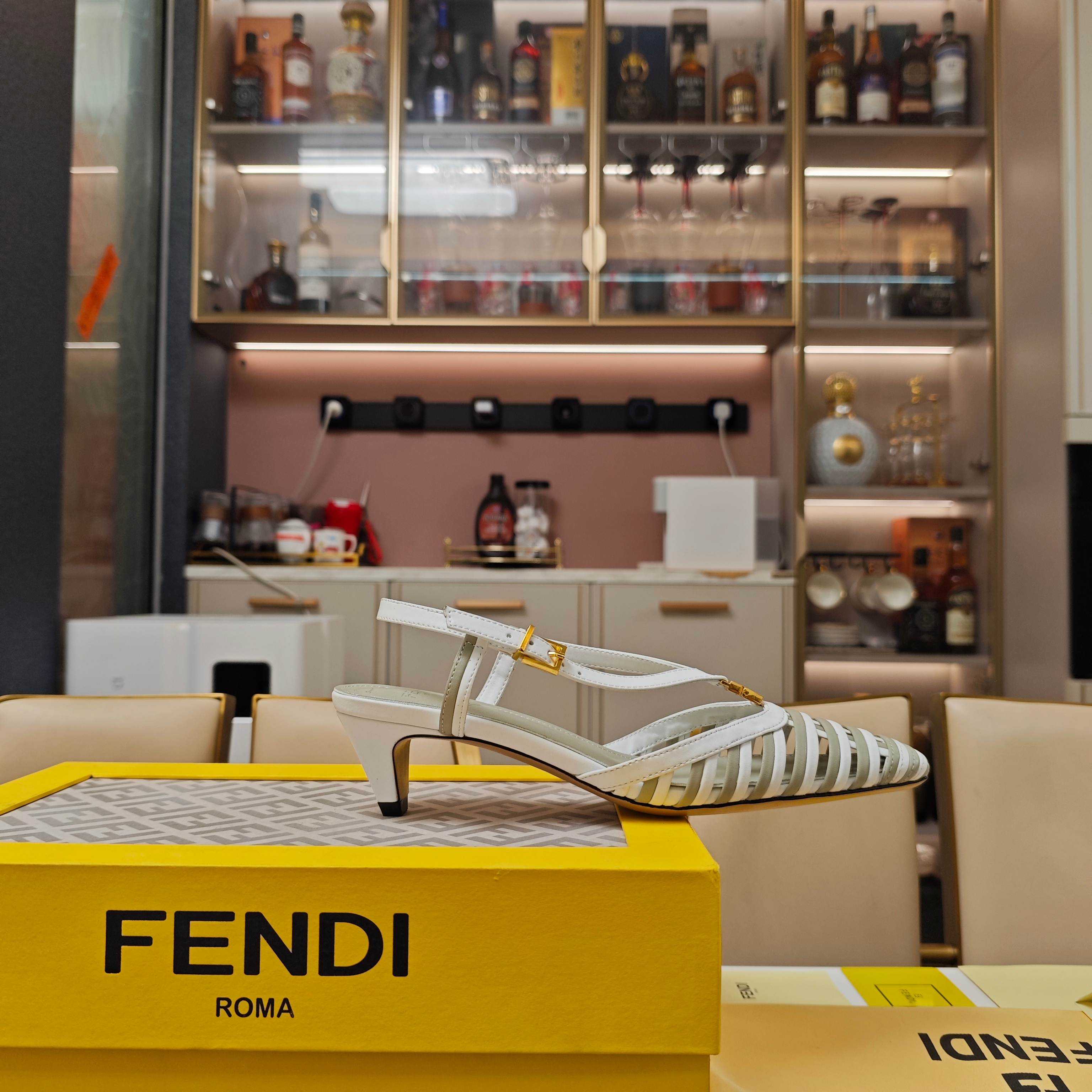 Fendi FFold Leather Low-heeled Slingbacks - FashionPlug