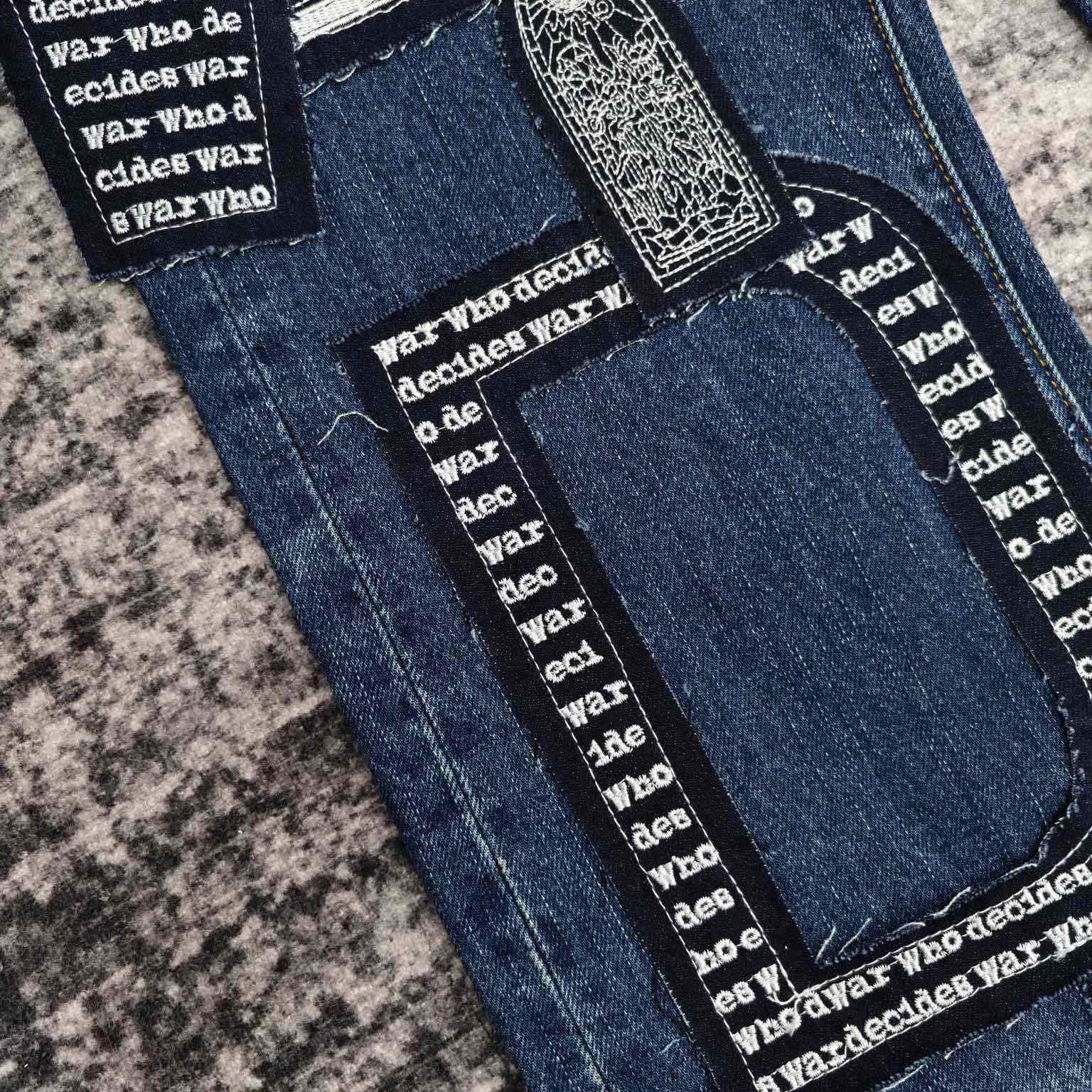 Who Decides War Motif Patched Jeans   702 - FashionPlug