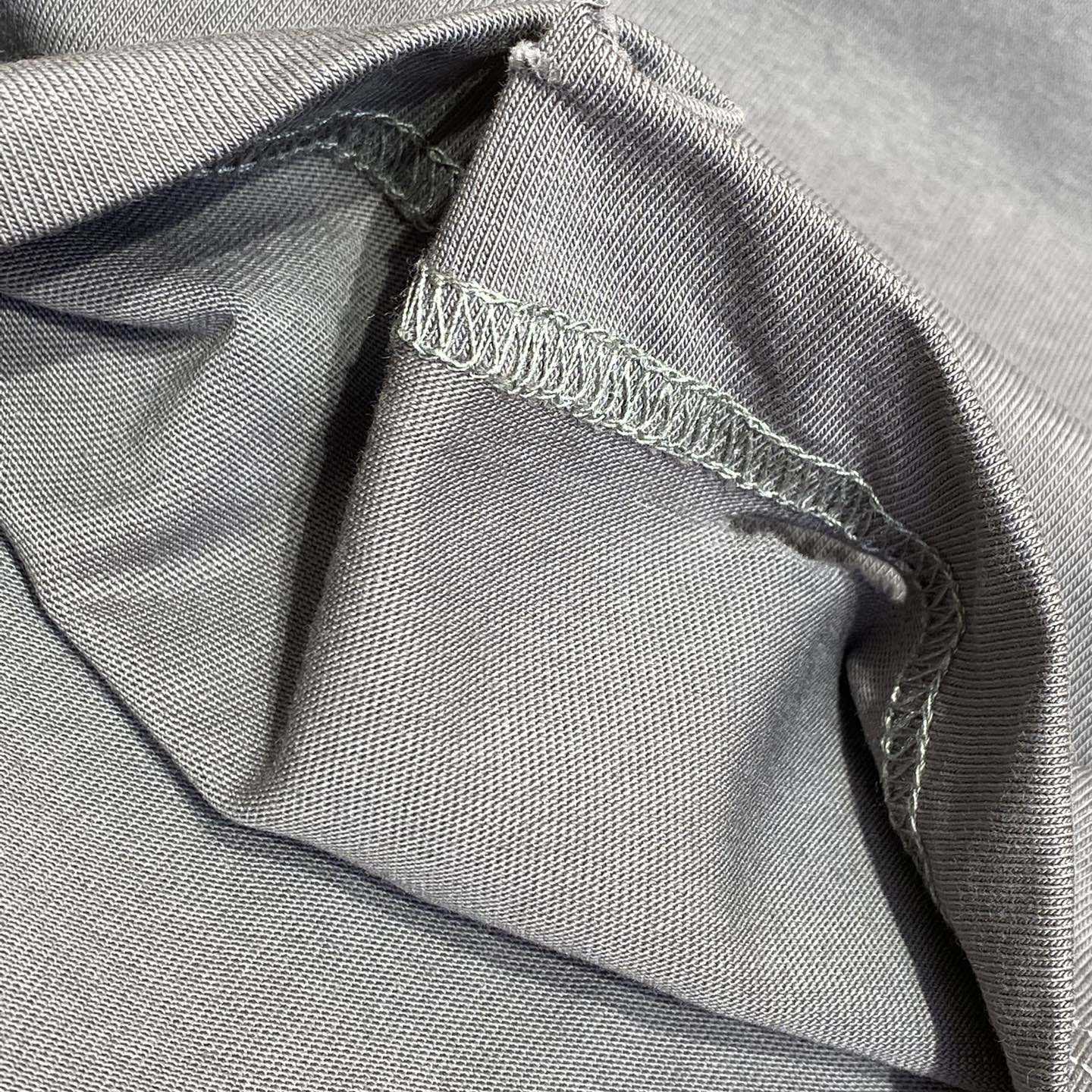 Balenciaga Human Being Shifted T-Shirt In Dark Grey - FashionPlug