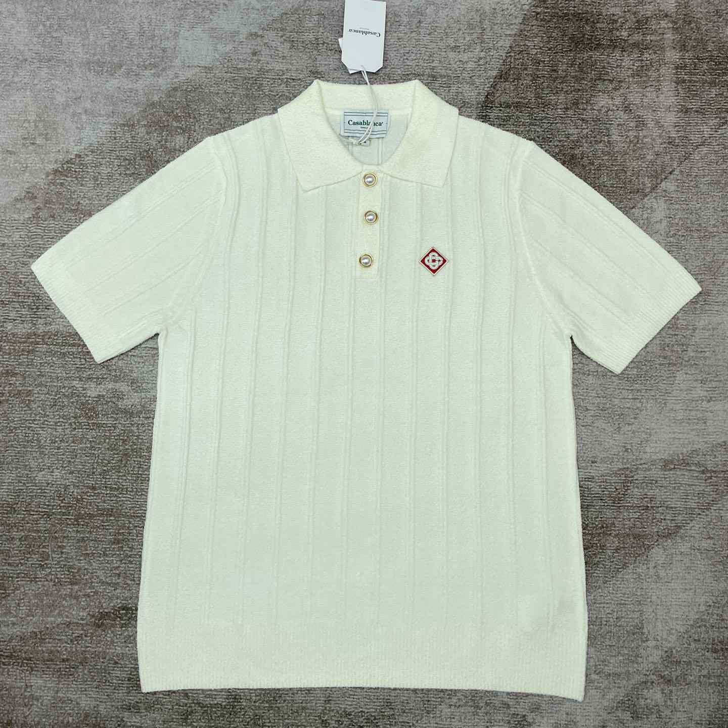 Casablanca Logo Appliqué Boucle Polo Shirt   D0016 - FashionPlug