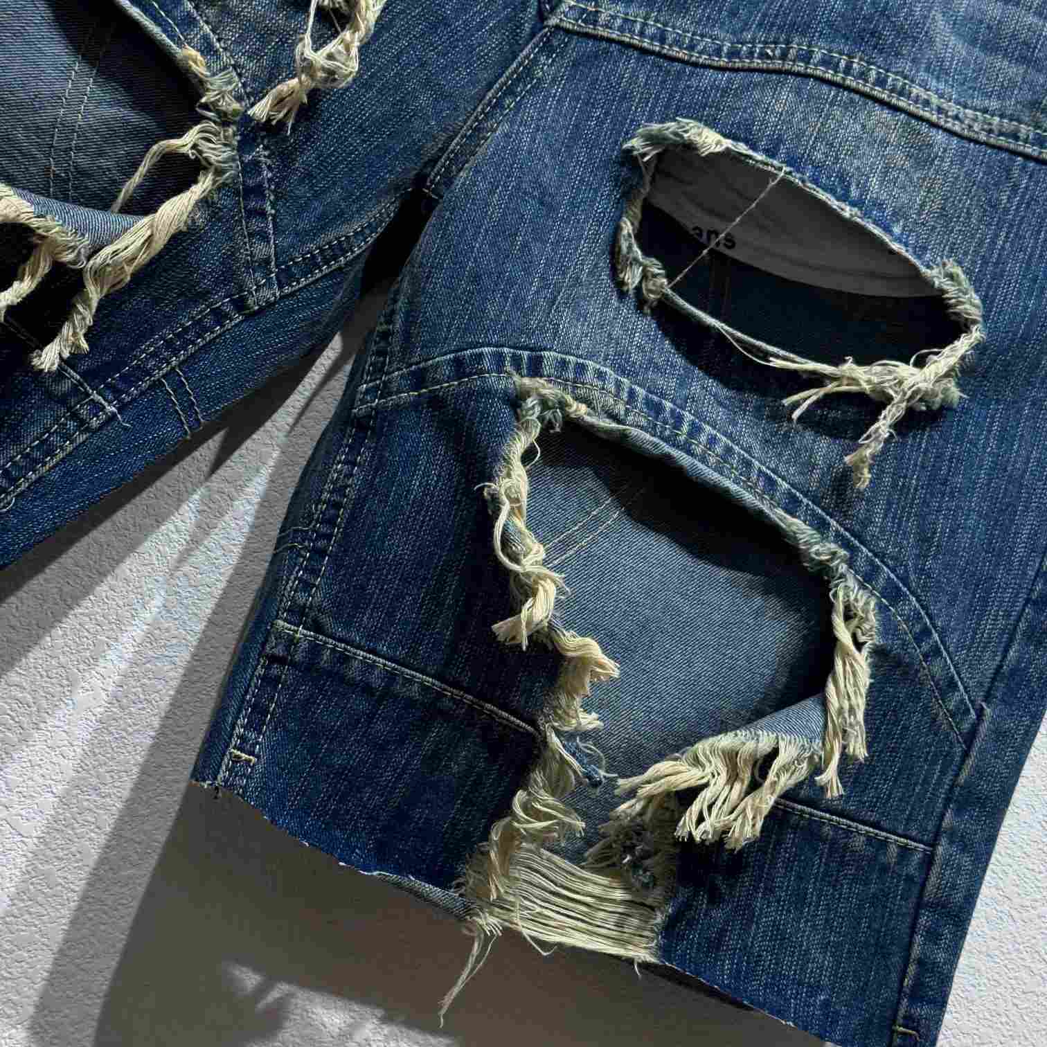 Balenciaga Distressed Baggy Shorts In Blue - FashionPlug
