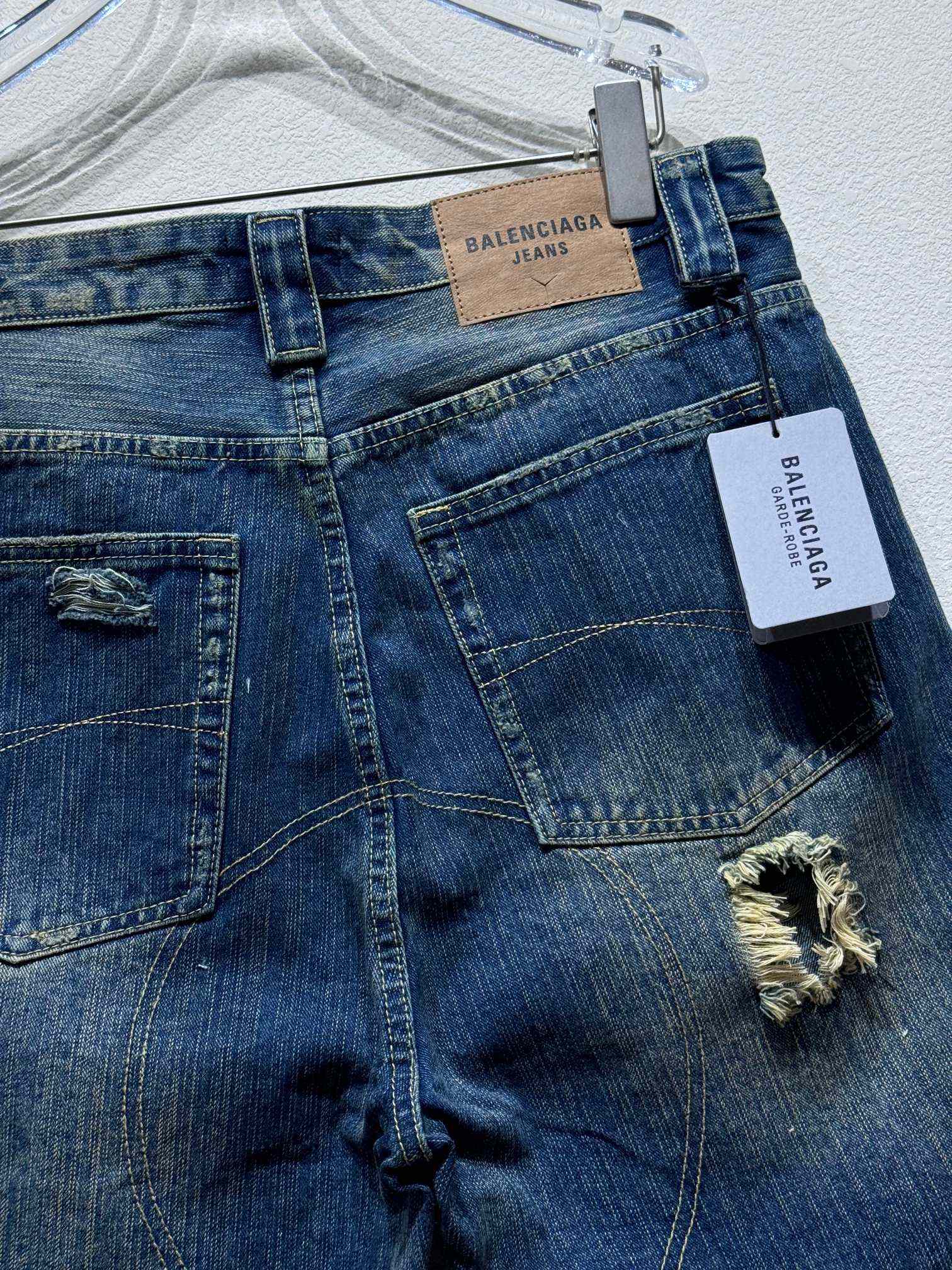 Balenciaga Distressed Baggy Shorts In Blue - FashionPlug