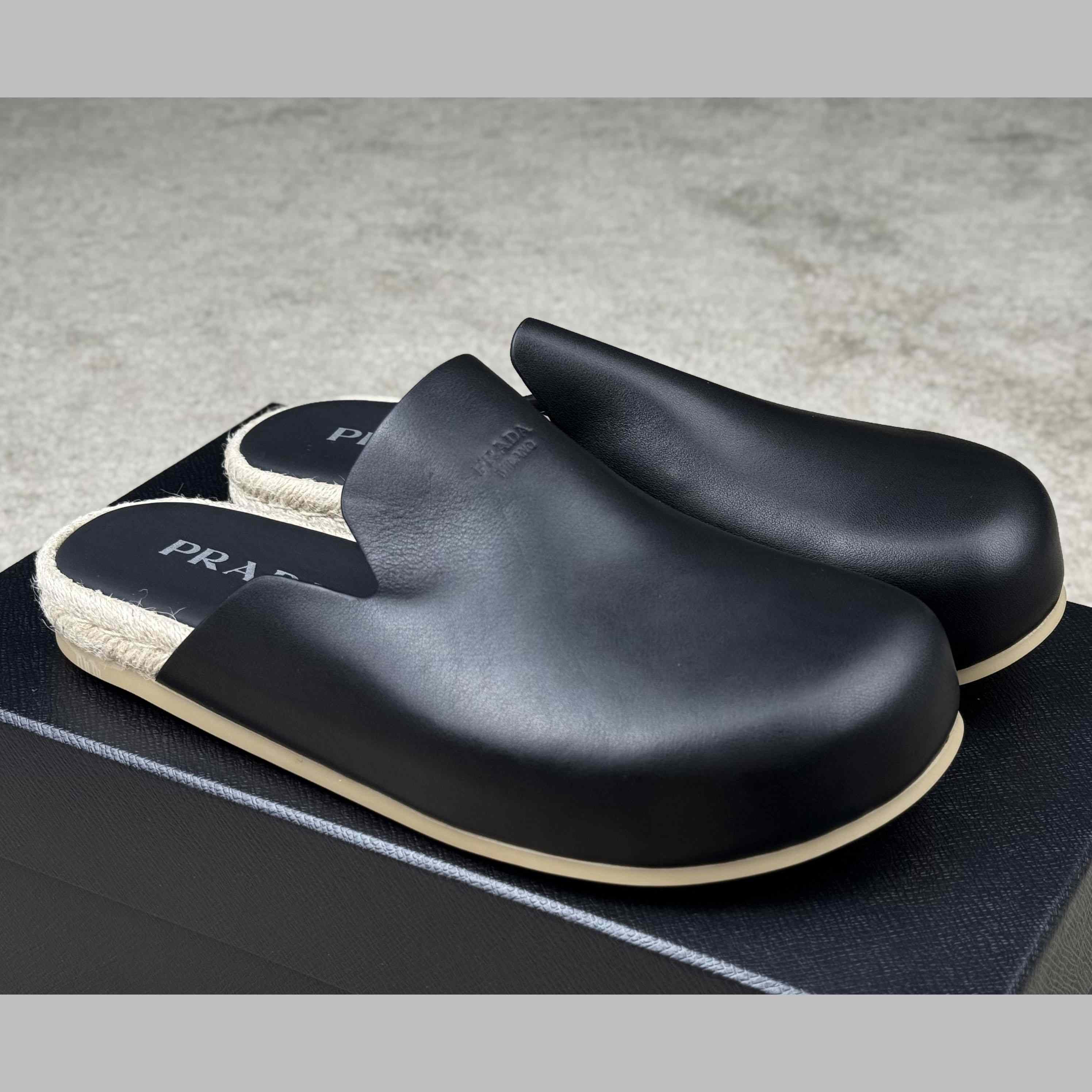 Prada Leather Mules - FashionPlug