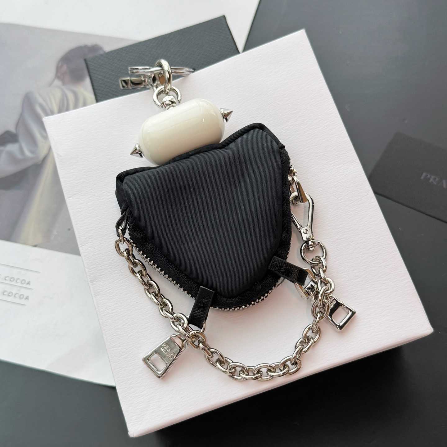 Prada Robot Trick Keychain - FashionPlug