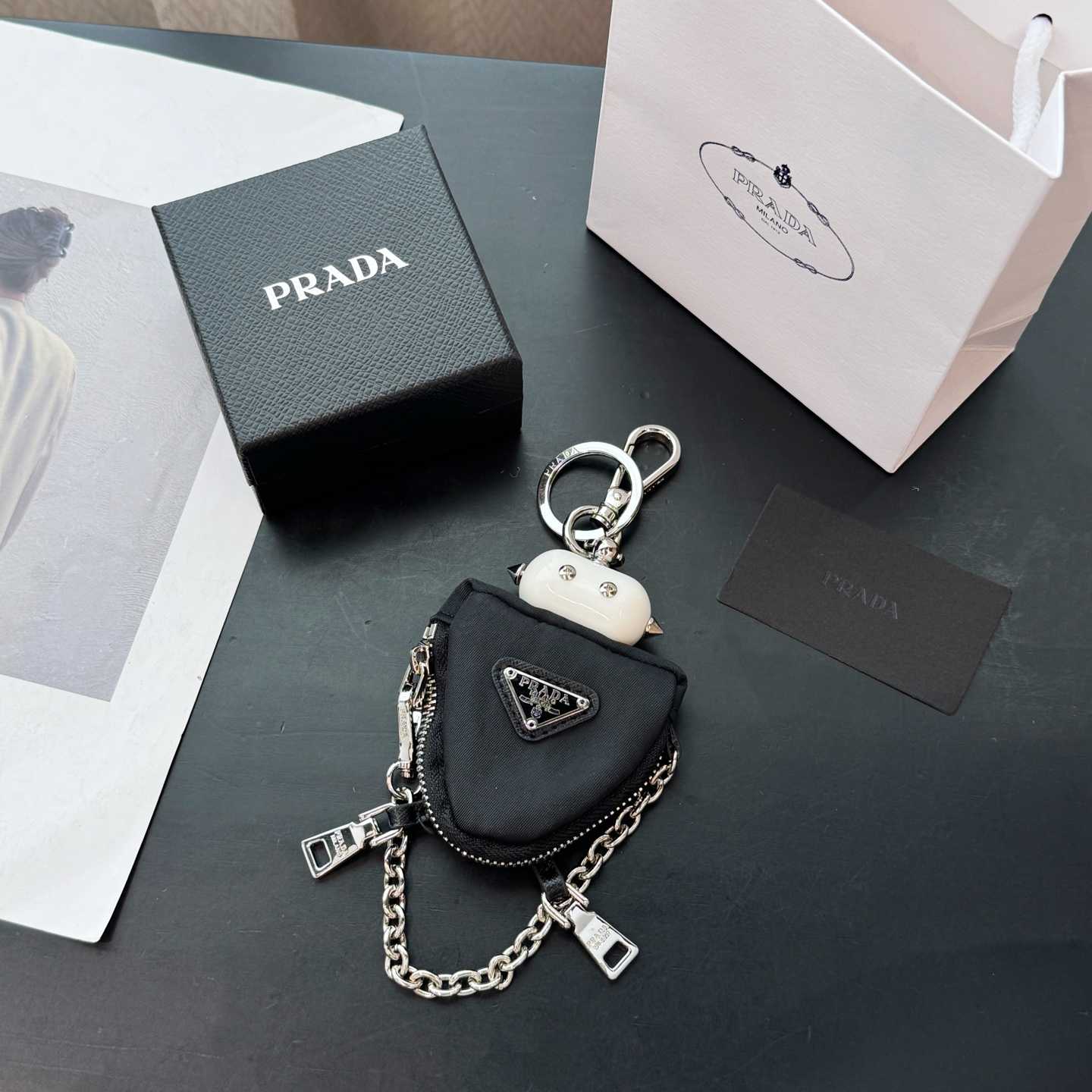 Prada Robot Trick Keychain - FashionPlug