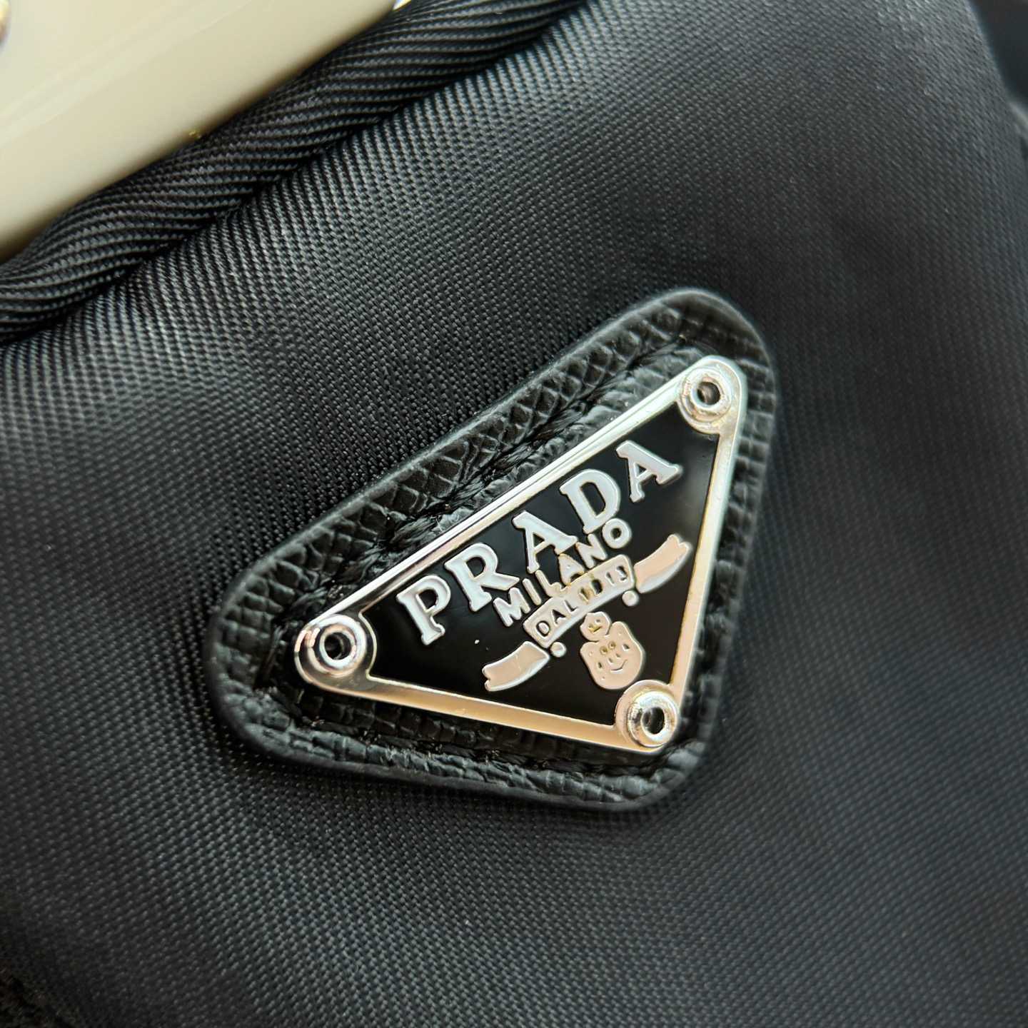 Prada Robot Trick Keychain - FashionPlug