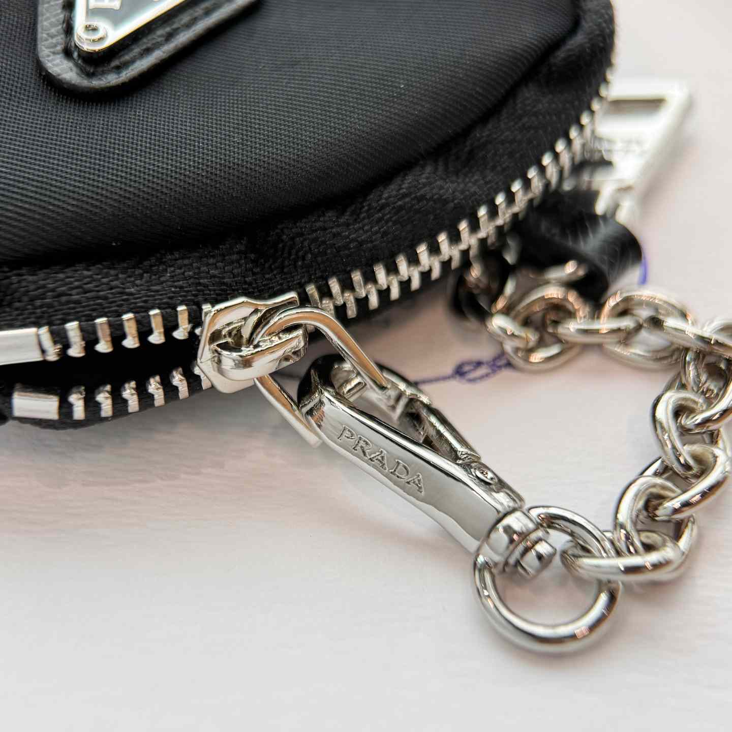 Prada Robot Trick Keychain - FashionPlug