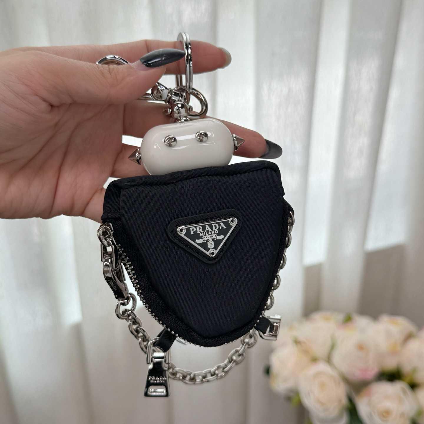 Prada Robot Trick Keychain - FashionPlug