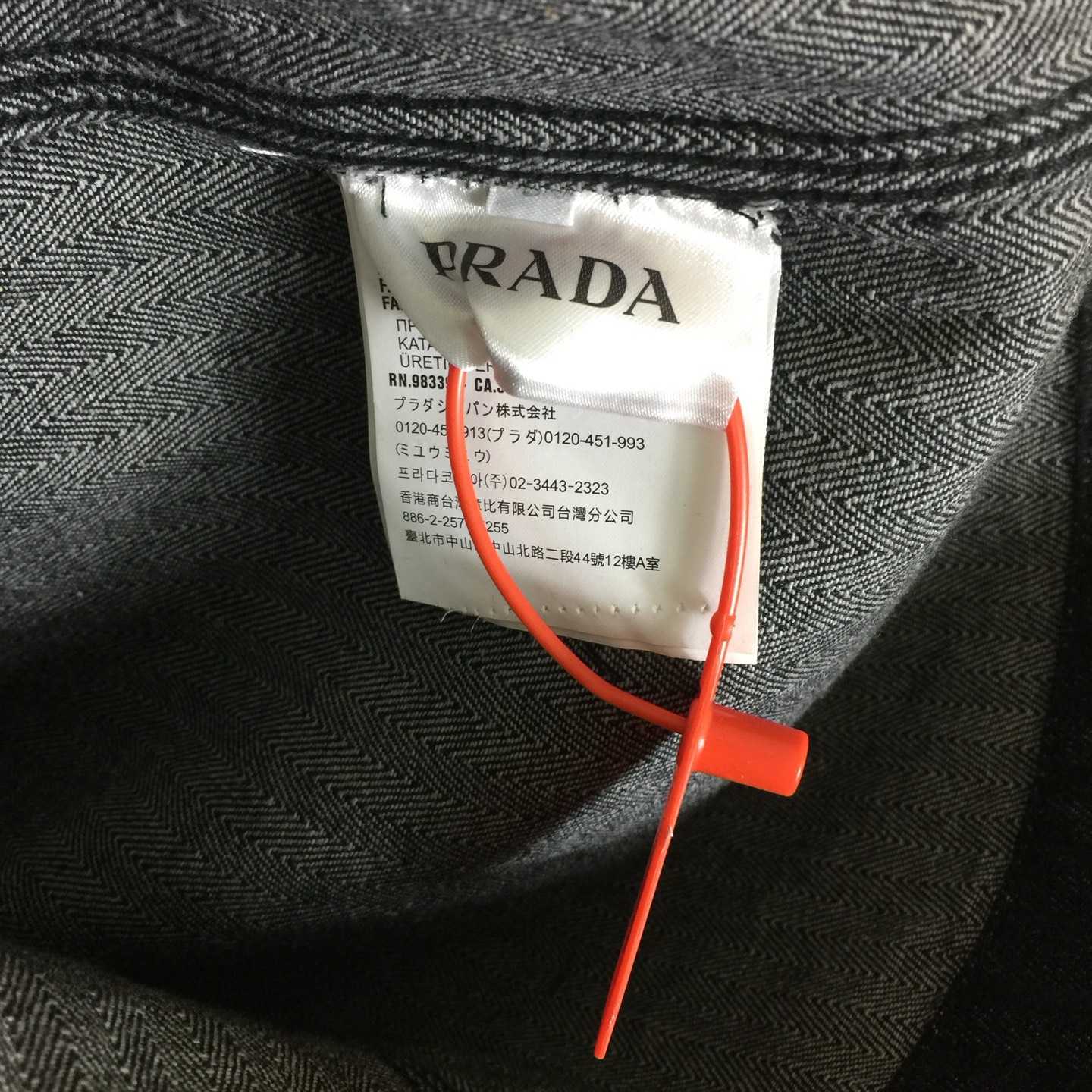 Prada Chevron Denim Blouson Jacket - FashionPlug