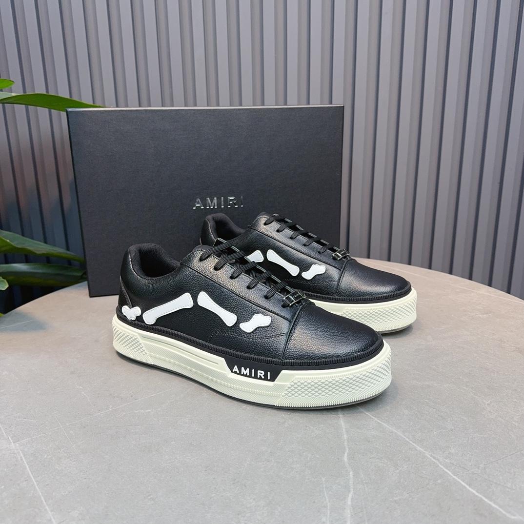 Amiri Low Top Sneakers - FashionPlug