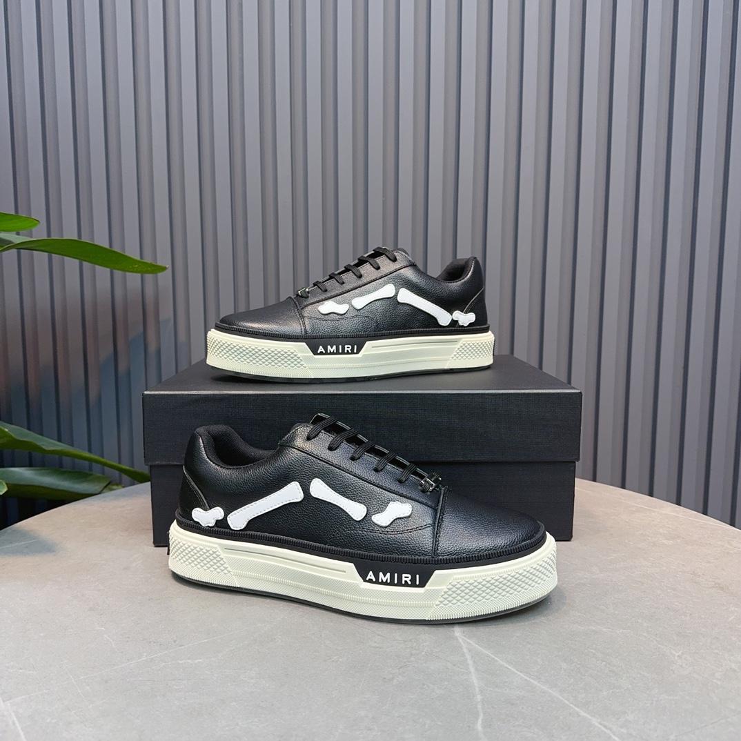 Amiri Low Top Sneakers - FashionPlug