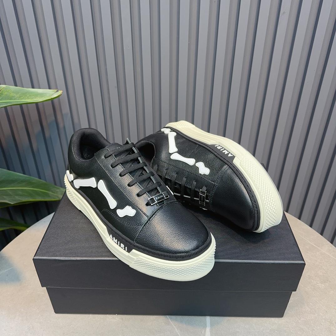 Amiri Low Top Sneakers - FashionPlug
