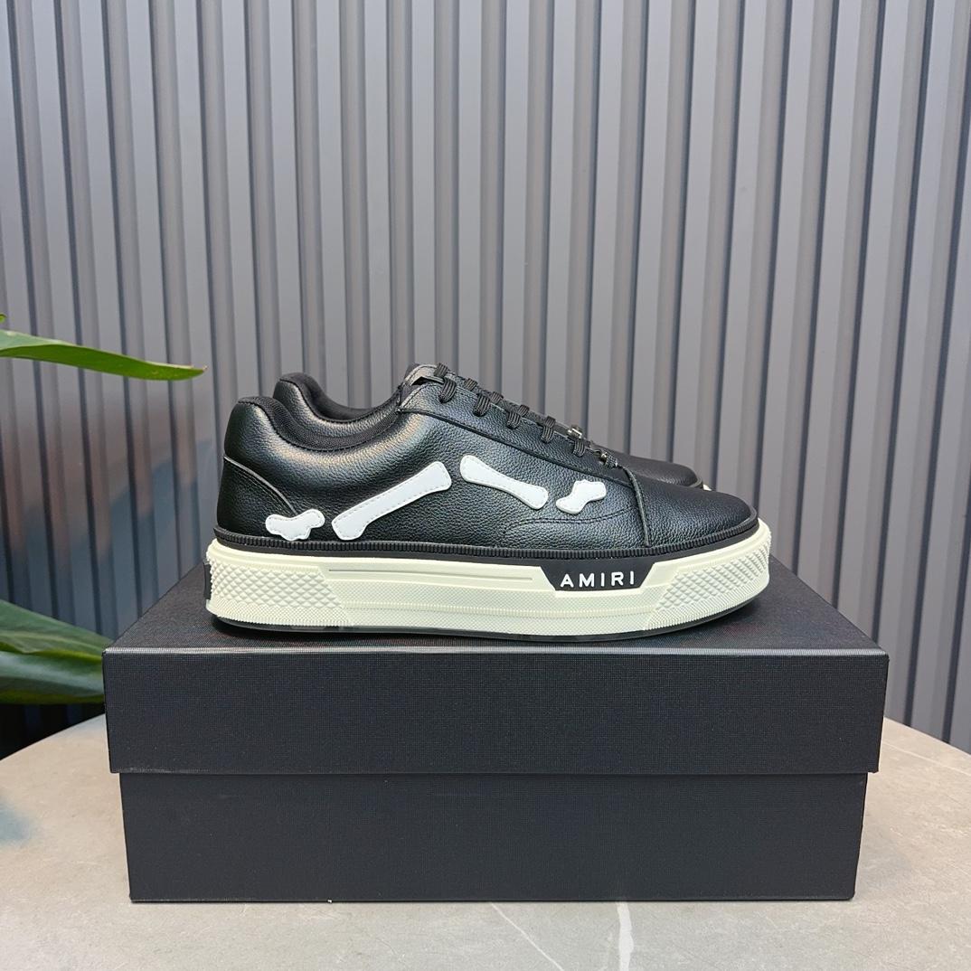 Amiri Low Top Sneakers - FashionPlug