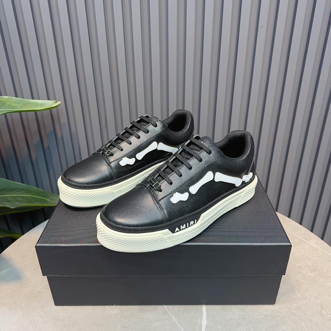 Amiri Low Top Sneakers - FashionPlug