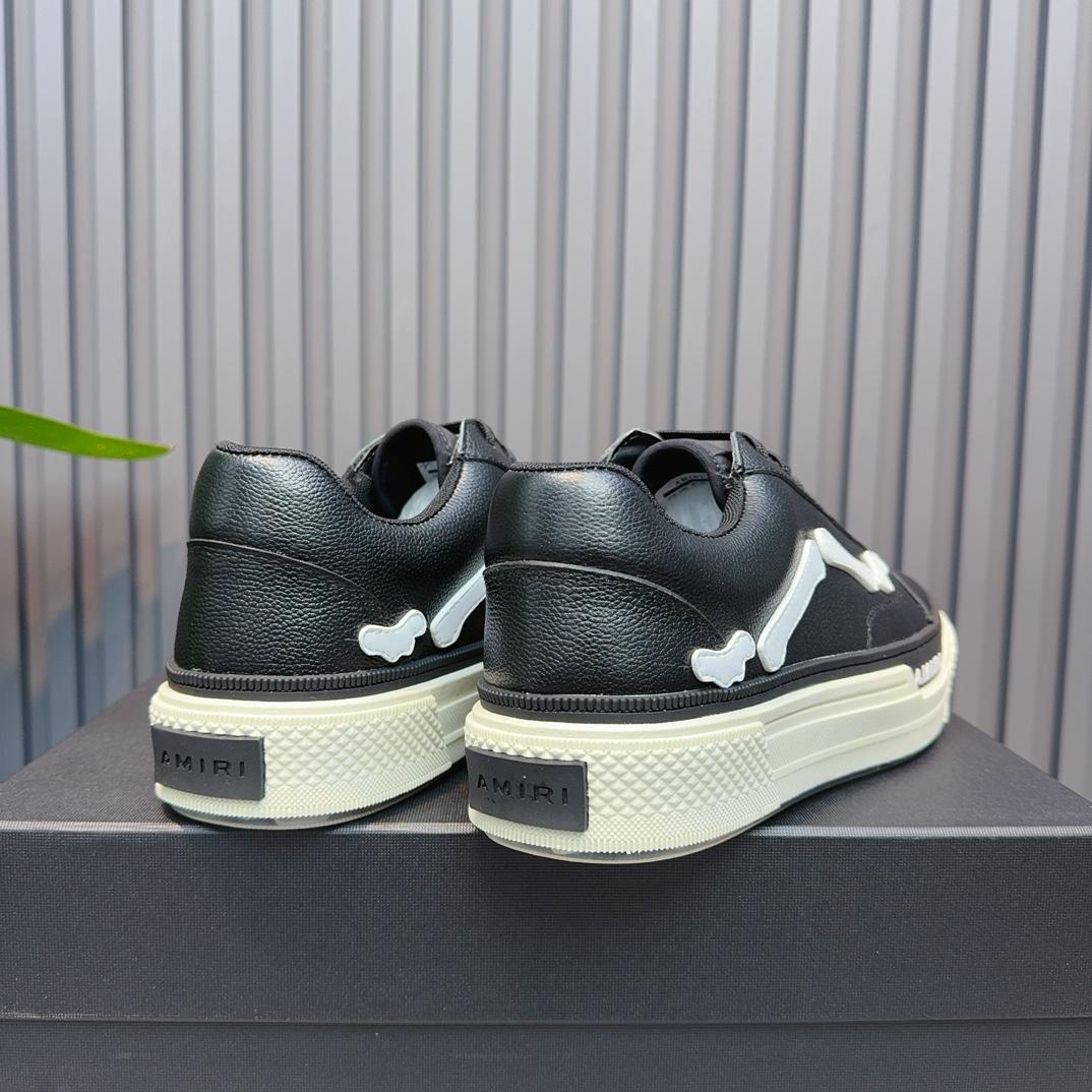 Amiri Low Top Sneakers - FashionPlug