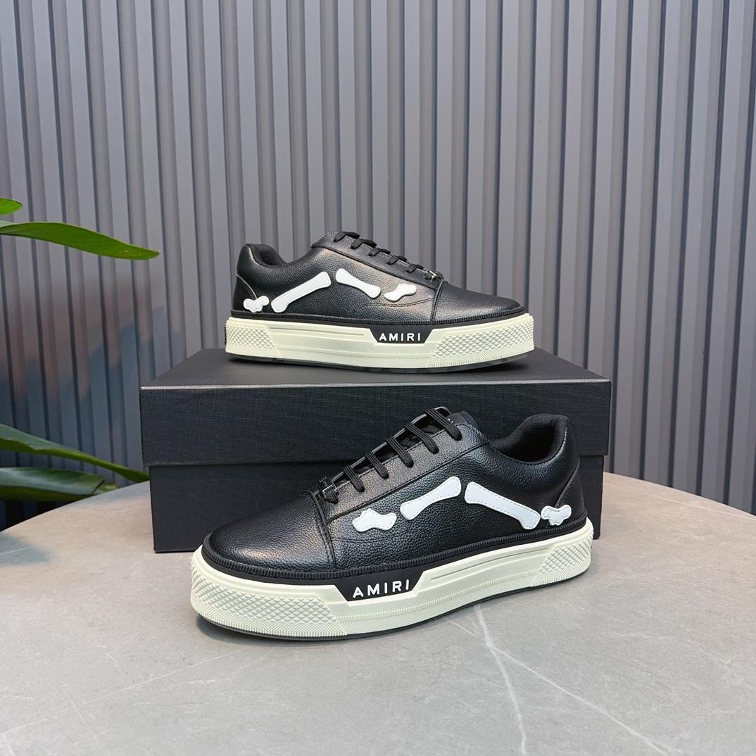 Amiri Low Top Sneakers - FashionPlug