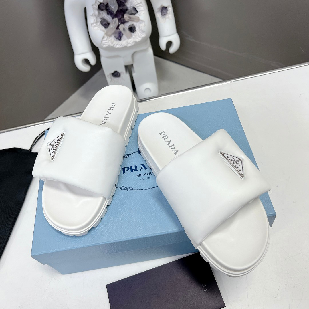 Prada Soft Padded Nappa Leather Slides - FashionPlug