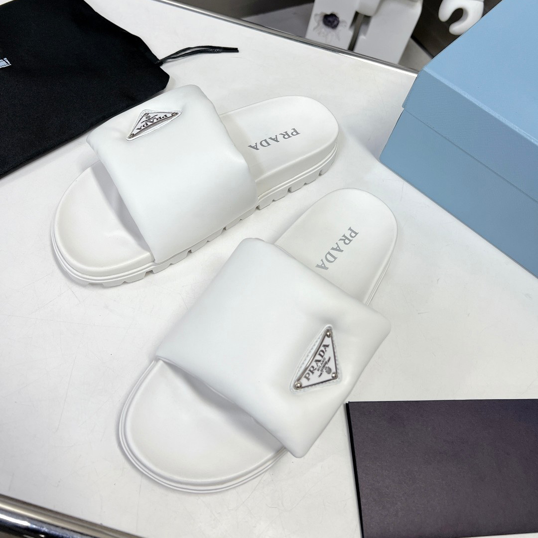 Prada Soft Padded Nappa Leather Slides - FashionPlug