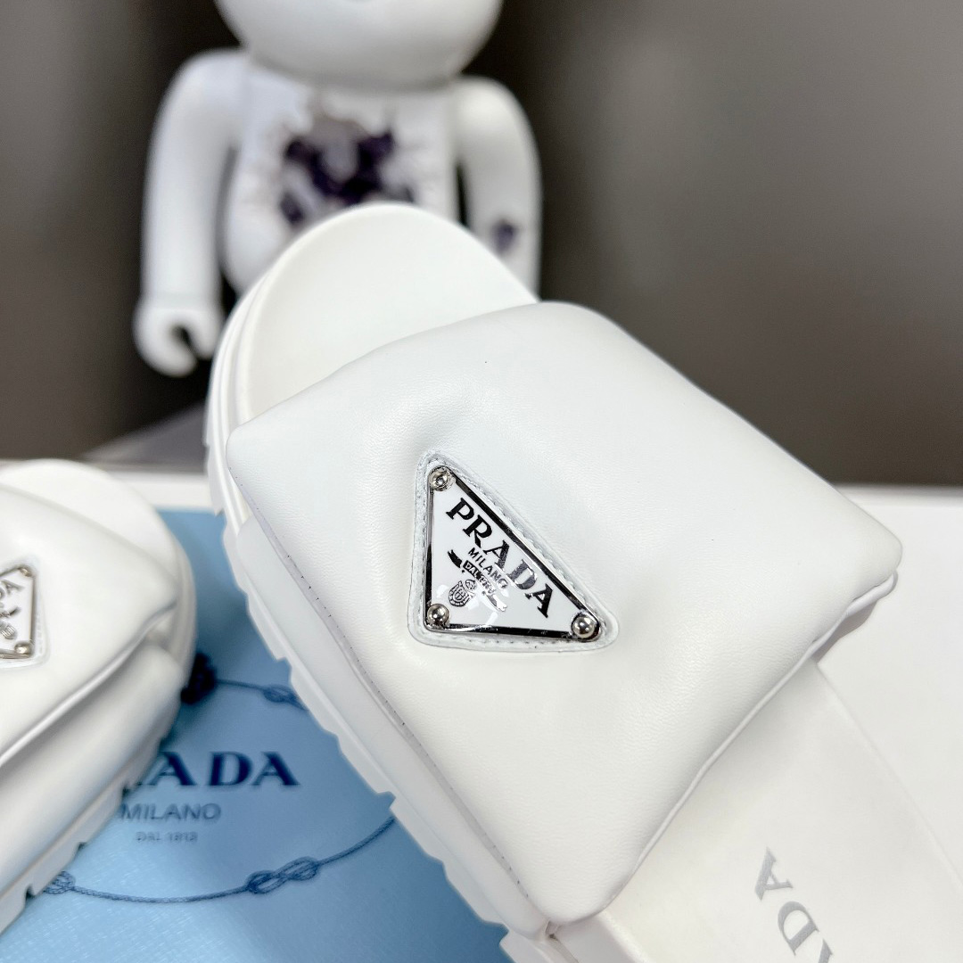 Prada Soft Padded Nappa Leather Slides - FashionPlug