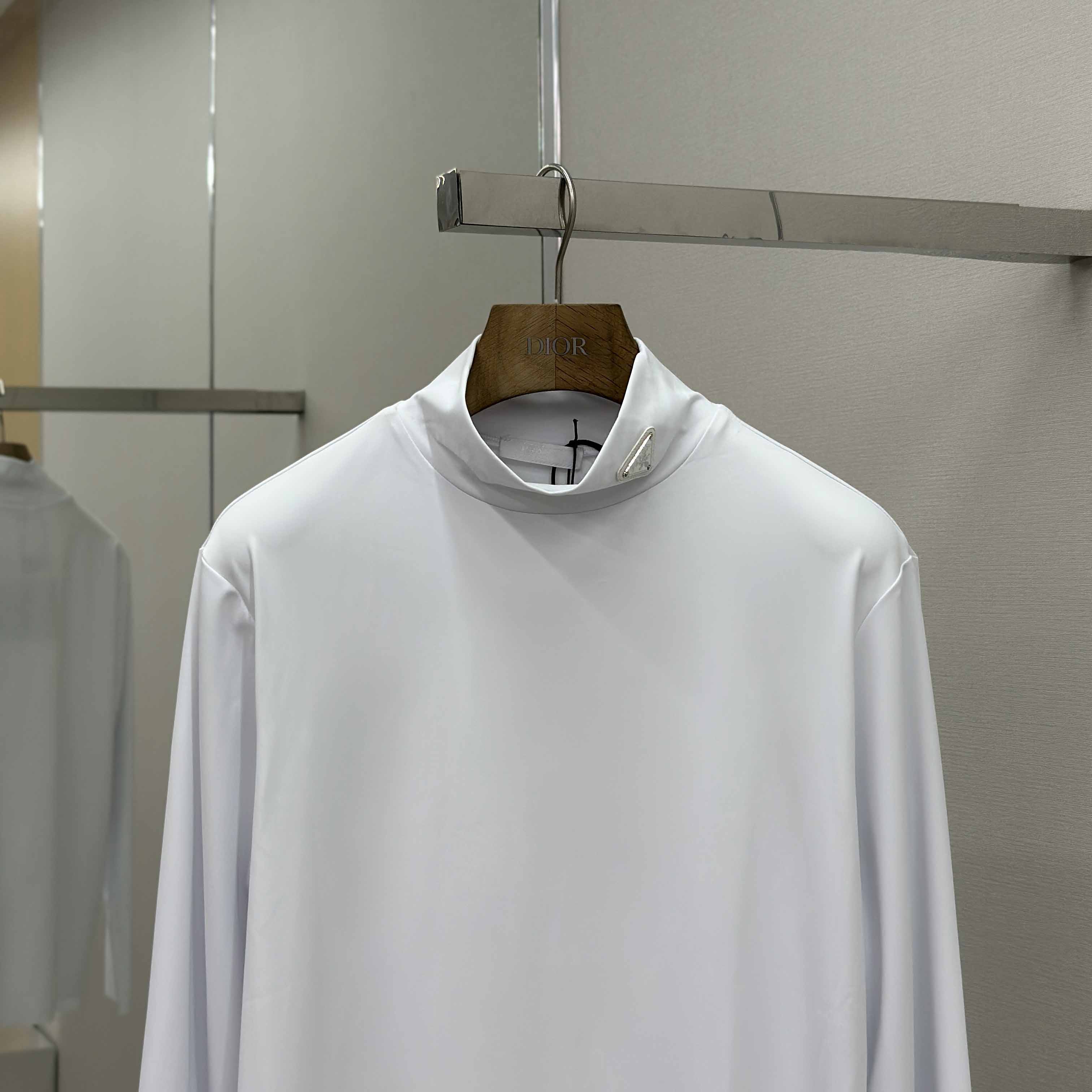 Prada Technical Jersey Mock Turtleneck - FashionPlug