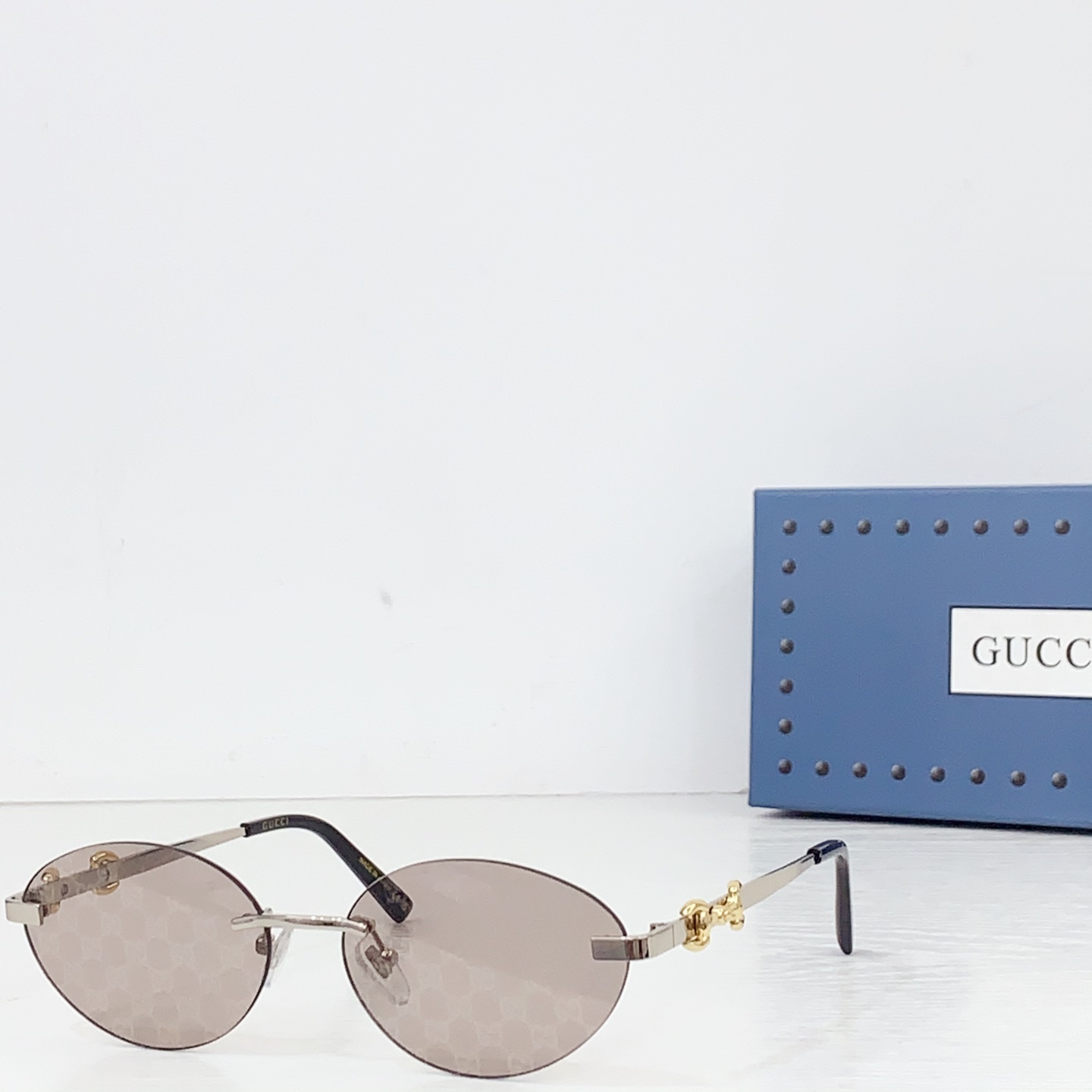 Gucci Frameless Oval Sunglasses - FashionPlug