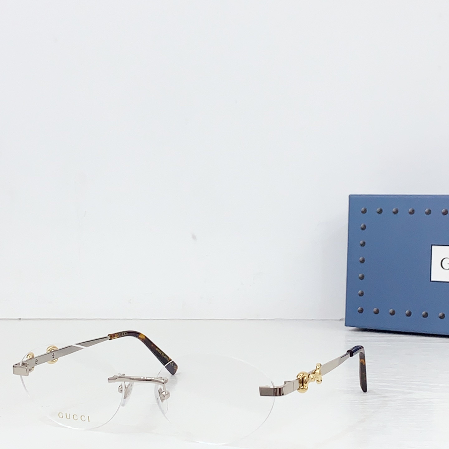 Gucci Frameless Oval Sunglasses - FashionPlug