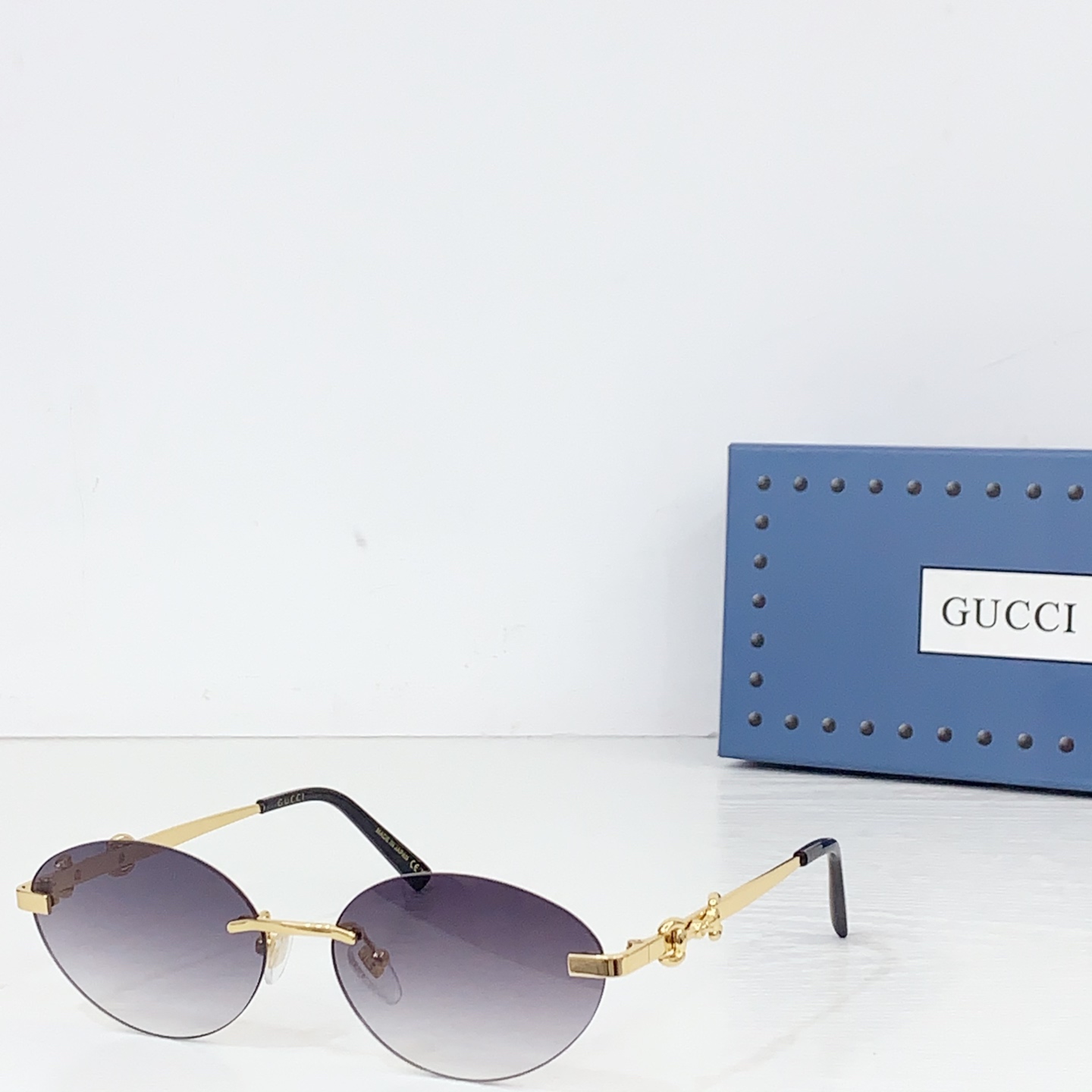 Gucci Frameless Oval Sunglasses - FashionPlug