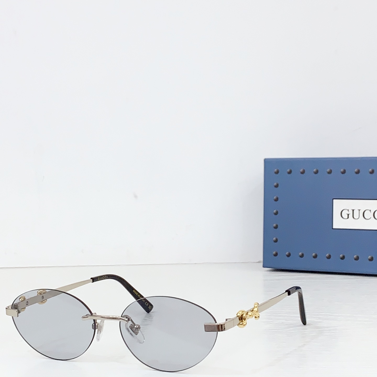 Gucci Frameless Oval Sunglasses - FashionPlug