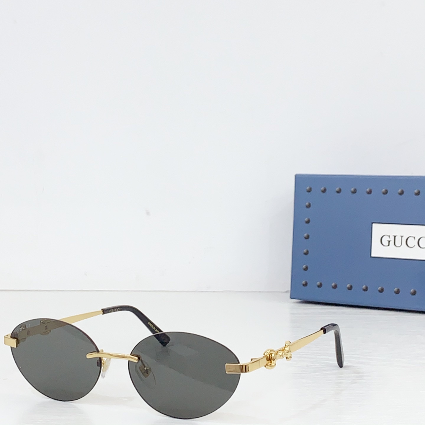 Gucci Frameless Oval Sunglasses - FashionPlug