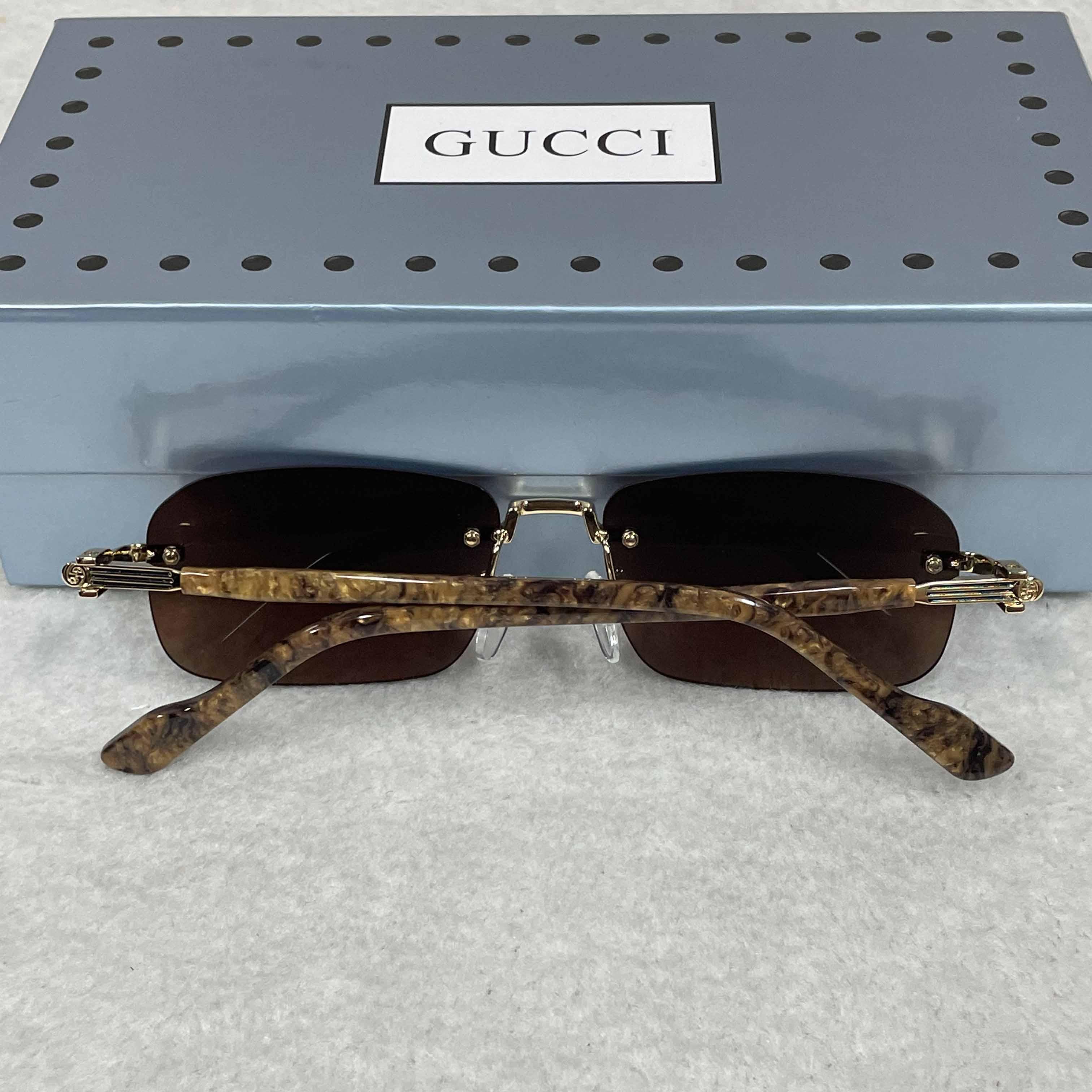 Gucci GG1221 Sunglasses - FashionPlug