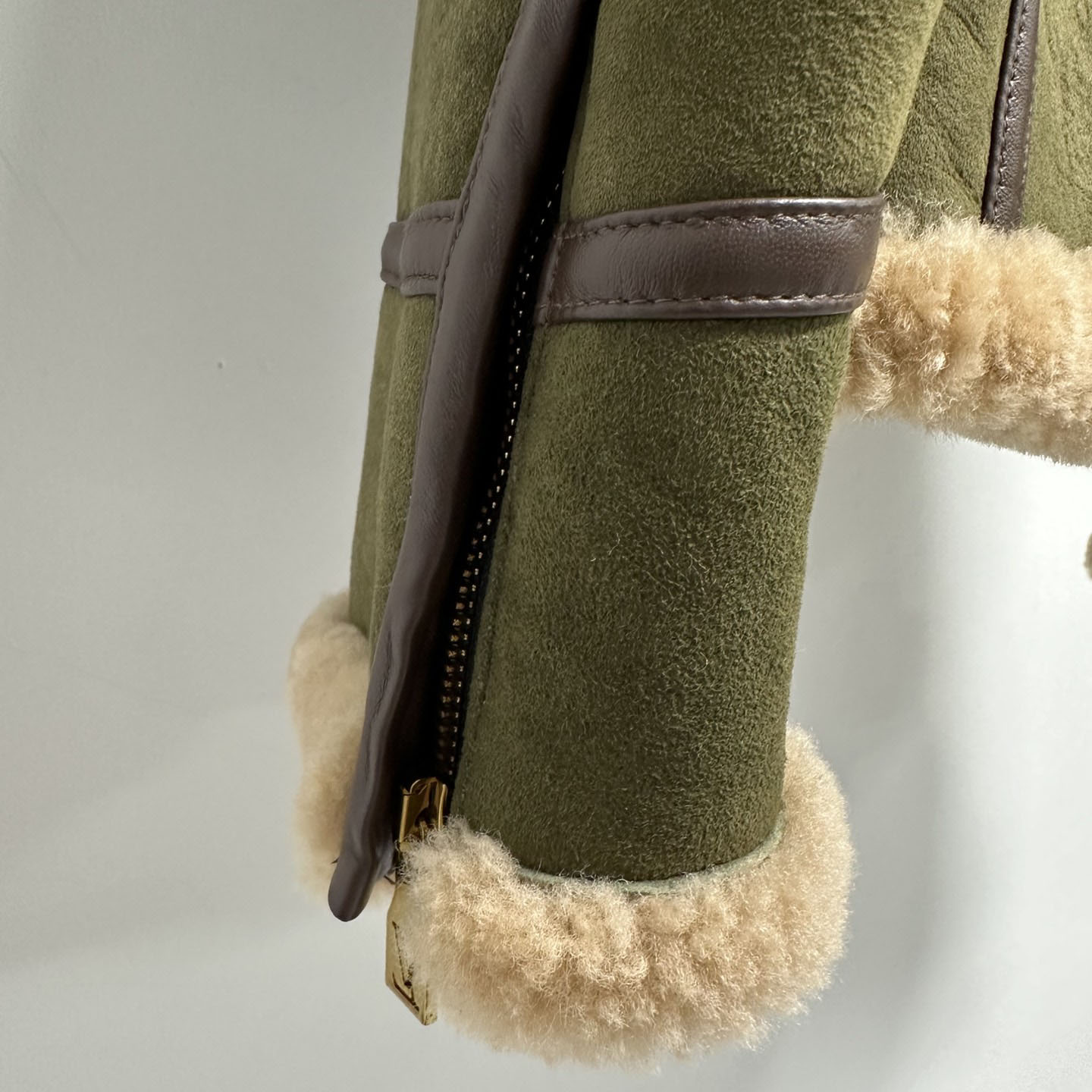 Louis Vuitton Shearling Bombardier - FashionPlug
