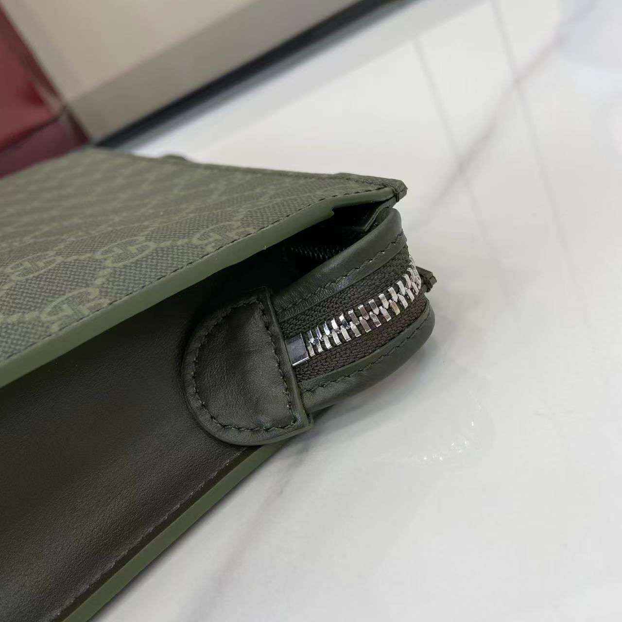 Gucci GG Monogram Small Pouch - FashionPlug