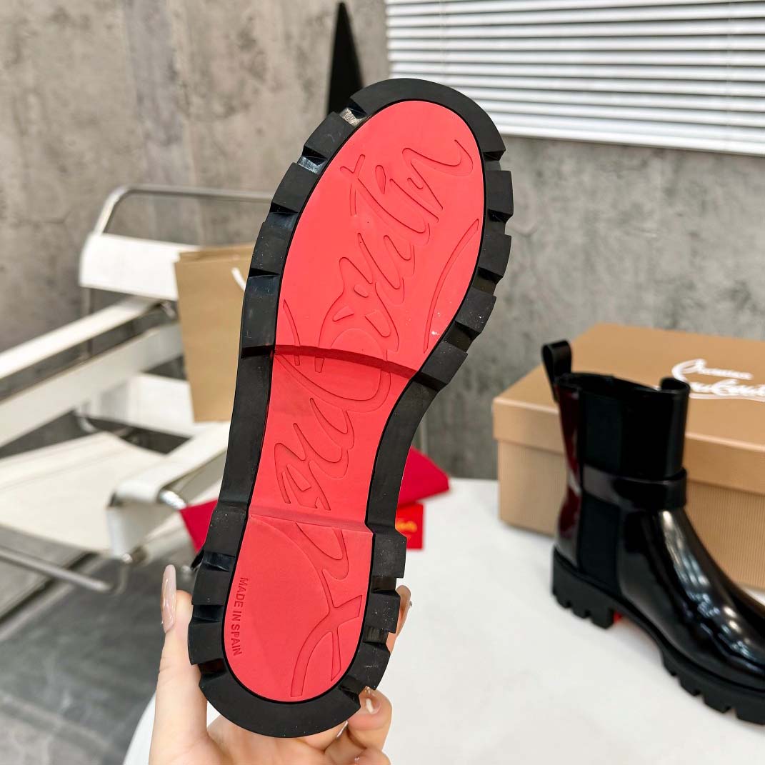 Christian Louboutin CL Chelsea Booty Lug Boots - FashionPlug