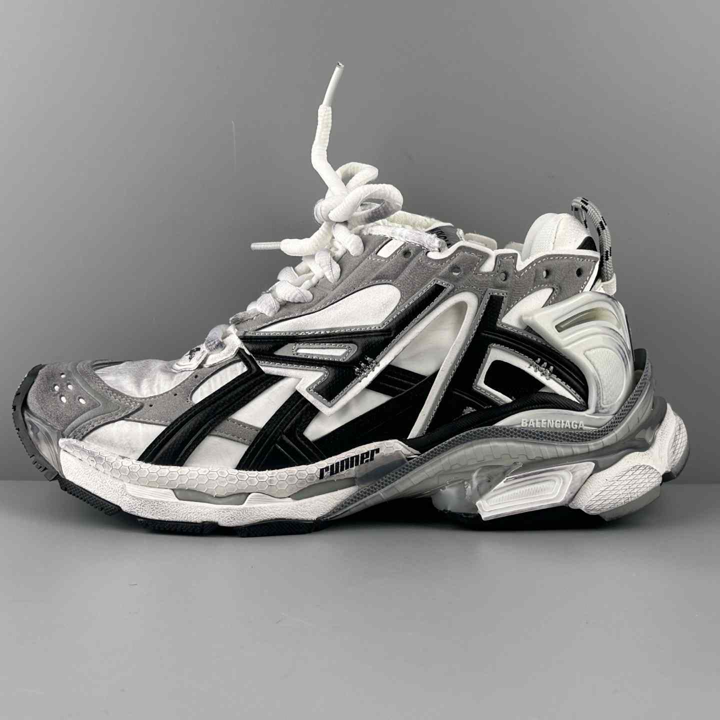 Balenciaga Runner Sneaker In Grey, White And Black - FashionPlug