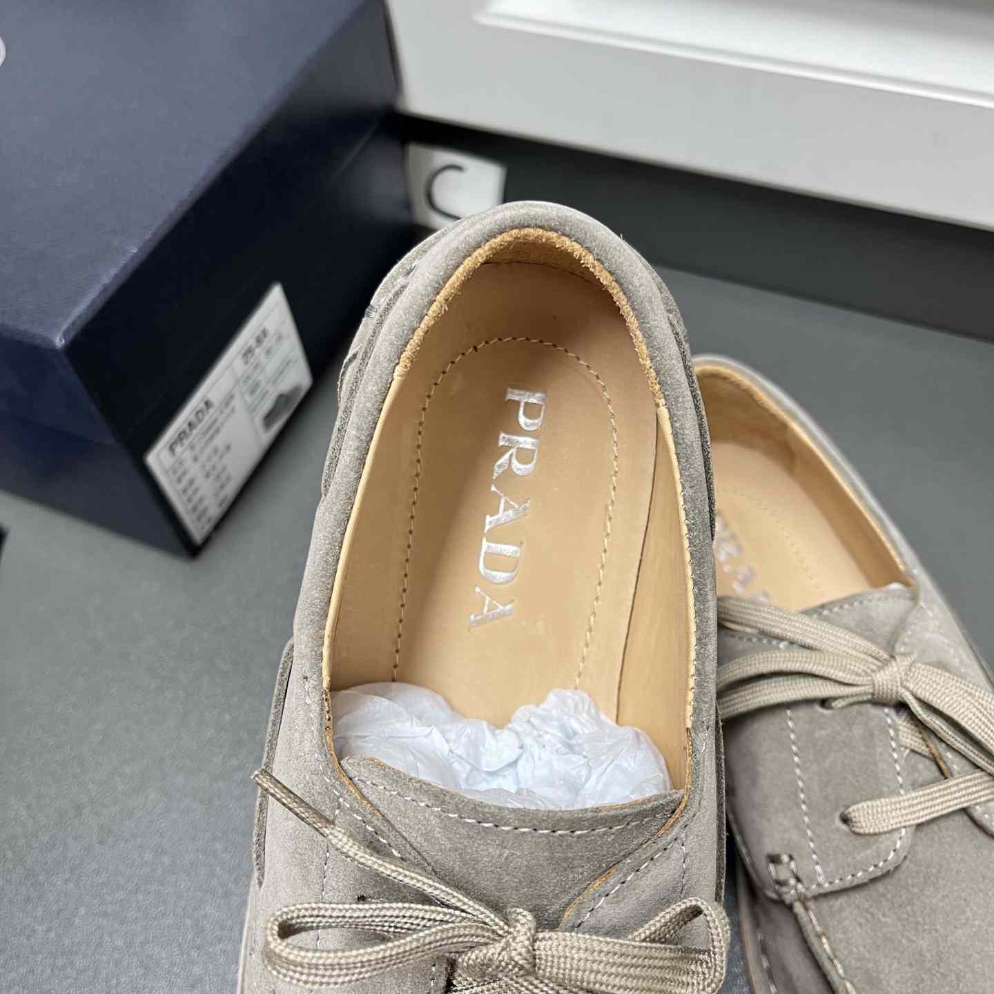 Prada Bleached Suede Loafers - FashionPlug