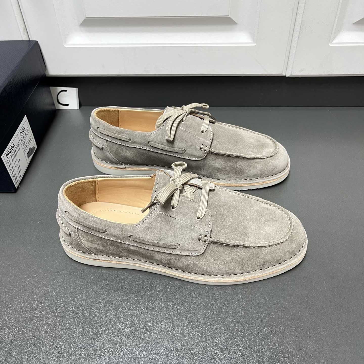 Prada Bleached Suede Loafers - FashionPlug