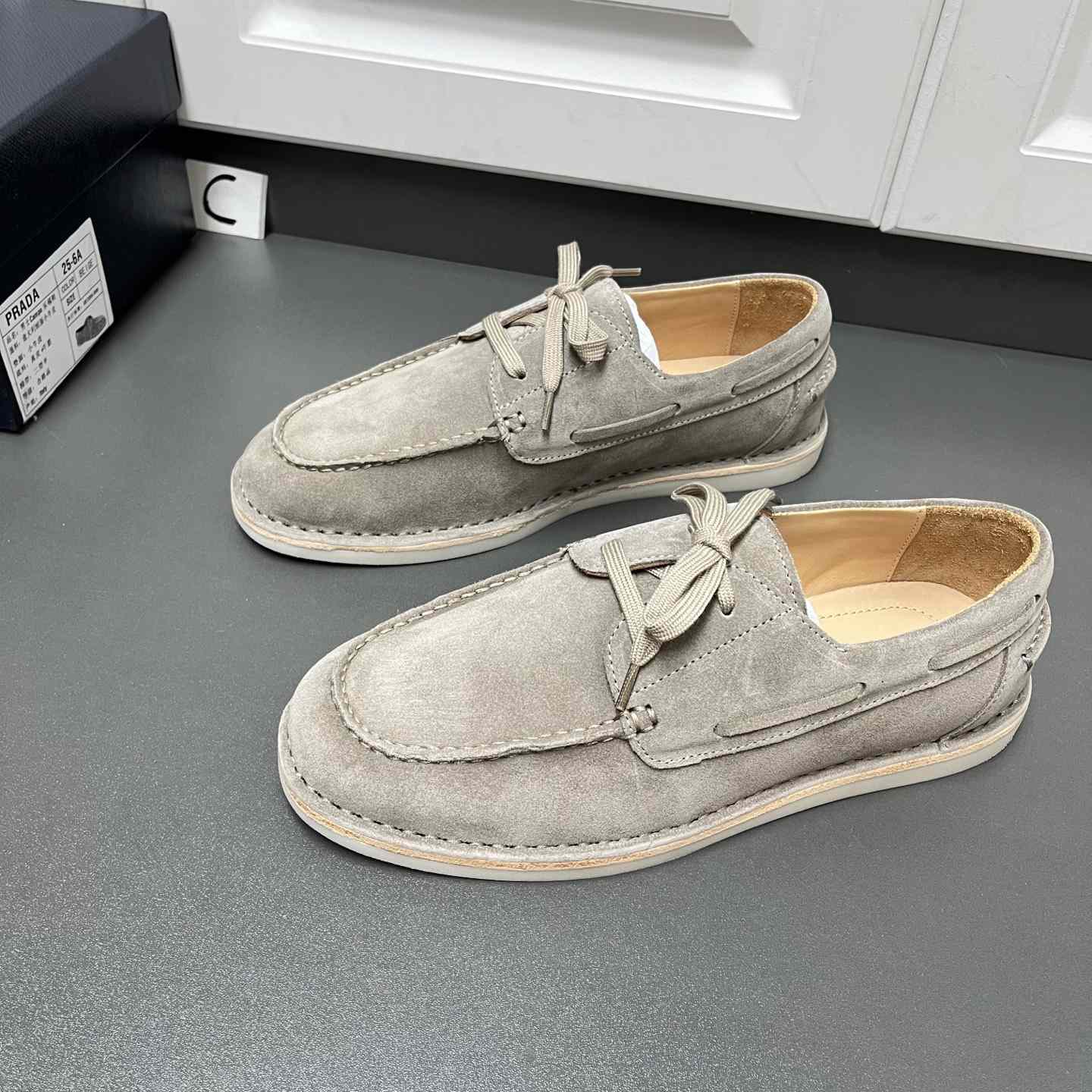 Prada Bleached Suede Loafers - FashionPlug