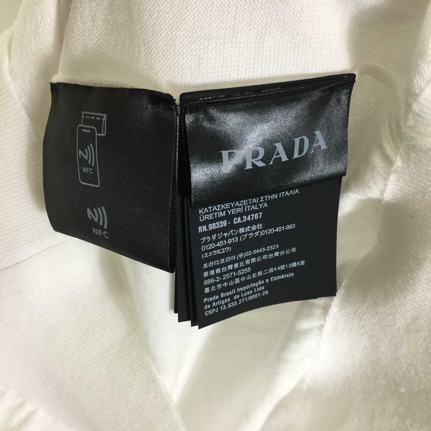 Prada White Wool Turtleneck - FashionPlug