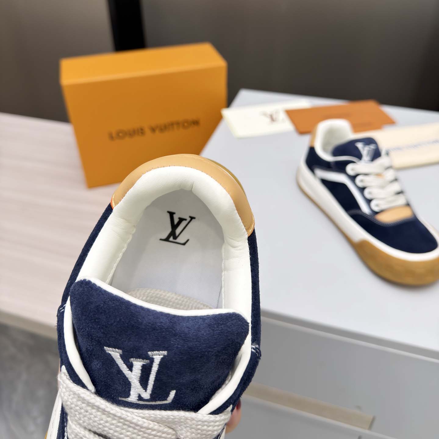Louis Vuitton LV Tilted Sneaker  - FashionPlug