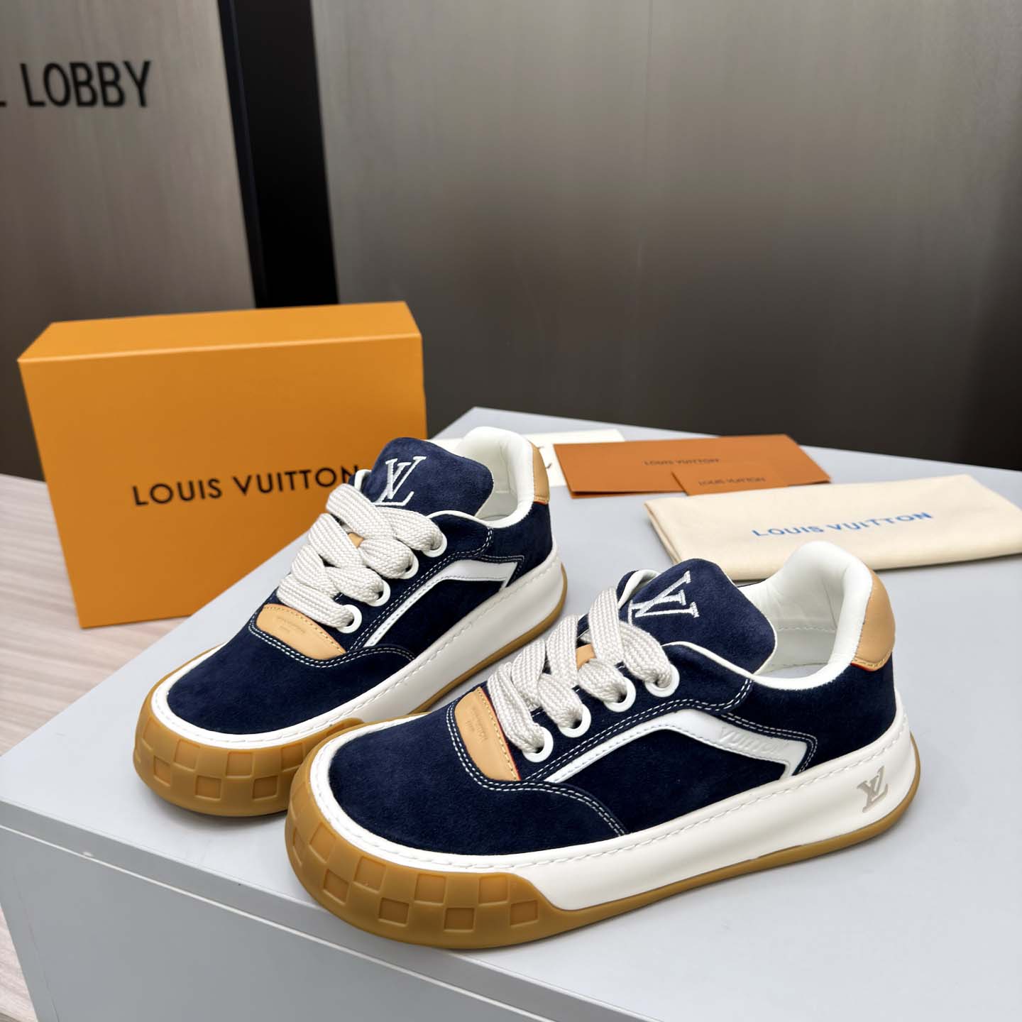 Louis Vuitton LV Tilted Sneaker  - FashionPlug