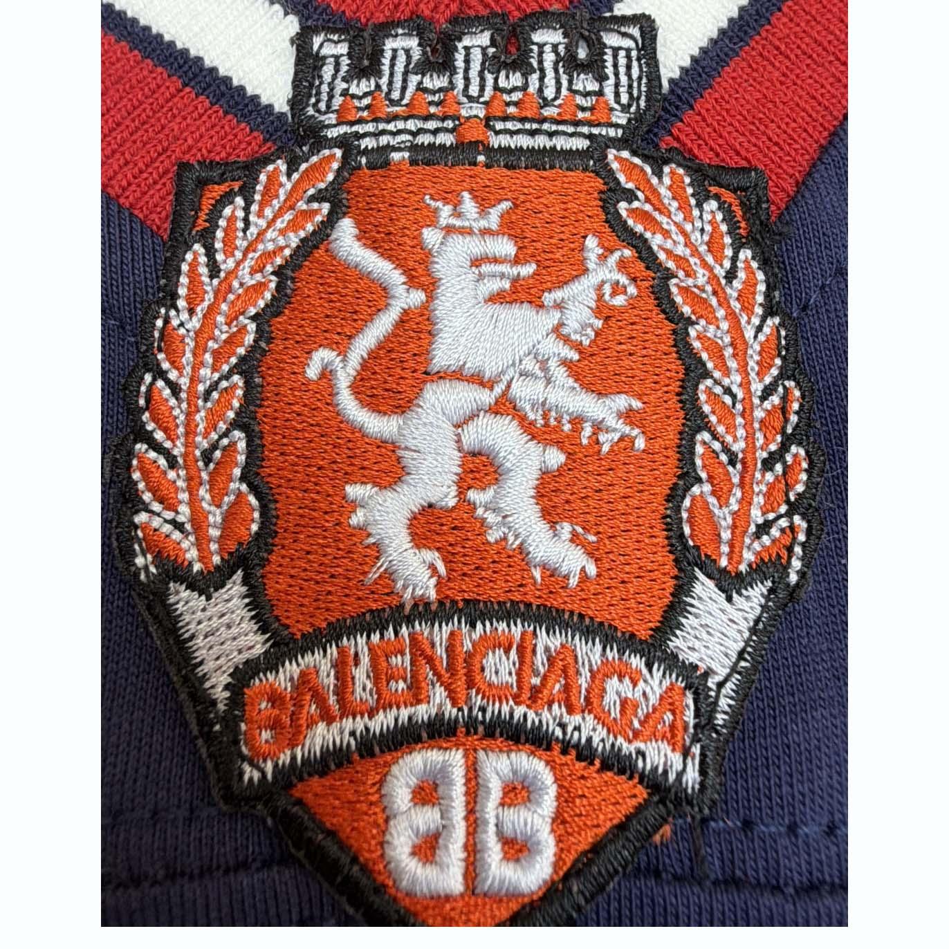 Balenciaga B Football V-Neck T-Shirt Oversized In Dark Navy - FashionPlug