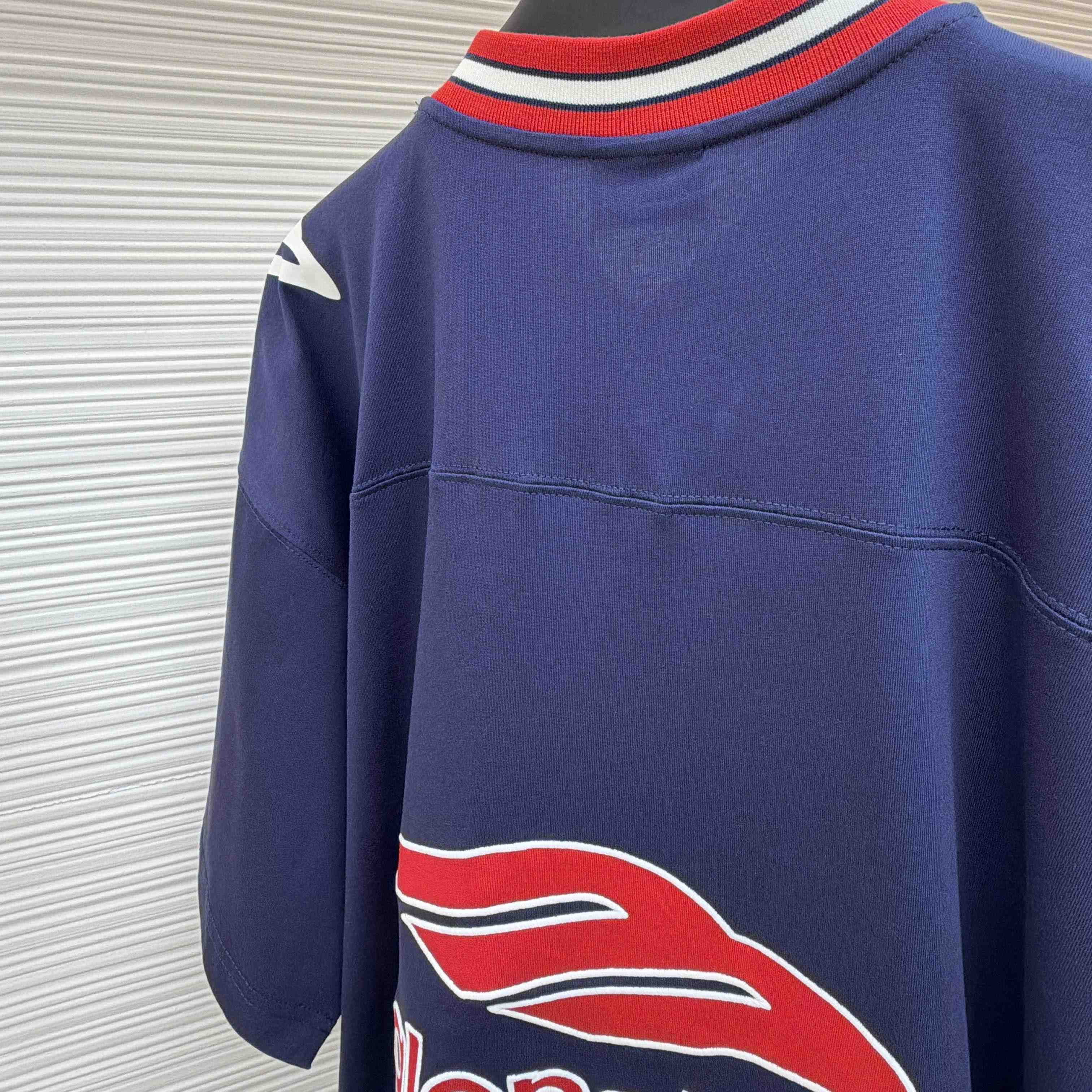 Balenciaga B Football V-Neck T-Shirt Oversized In Dark Navy - FashionPlug