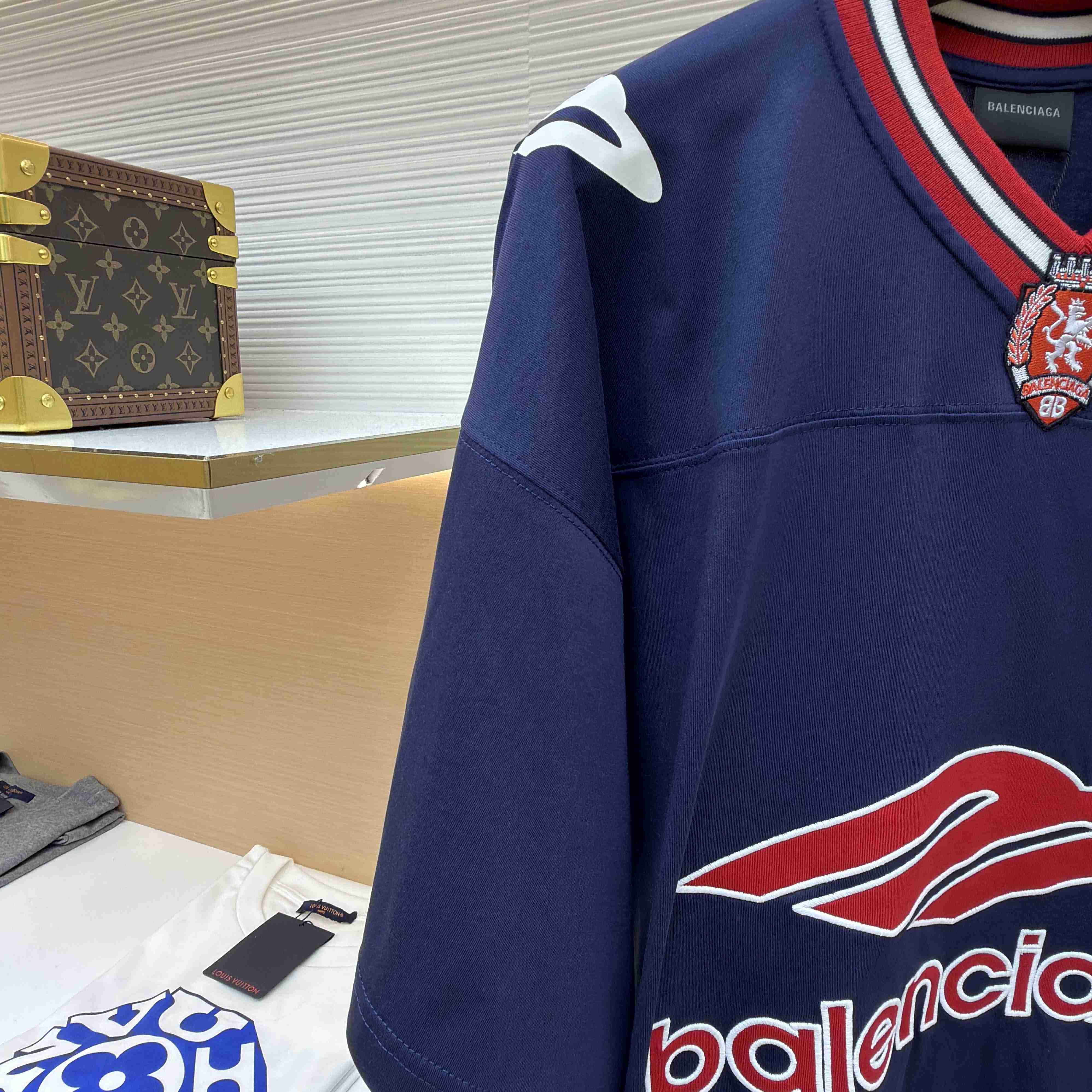 Balenciaga B Football V-Neck T-Shirt Oversized In Dark Navy - FashionPlug