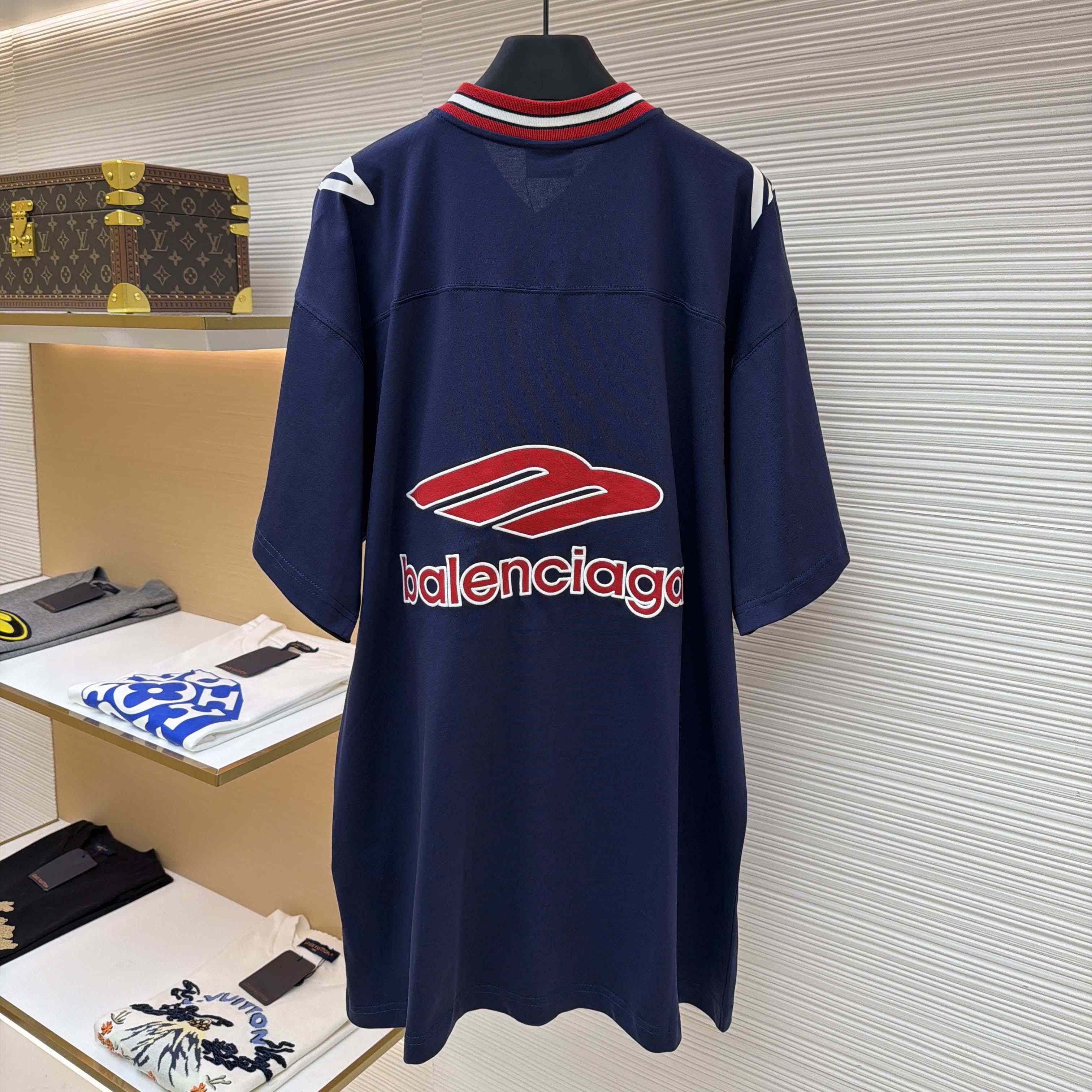 Balenciaga B Football V-Neck T-Shirt Oversized In Dark Navy - FashionPlug