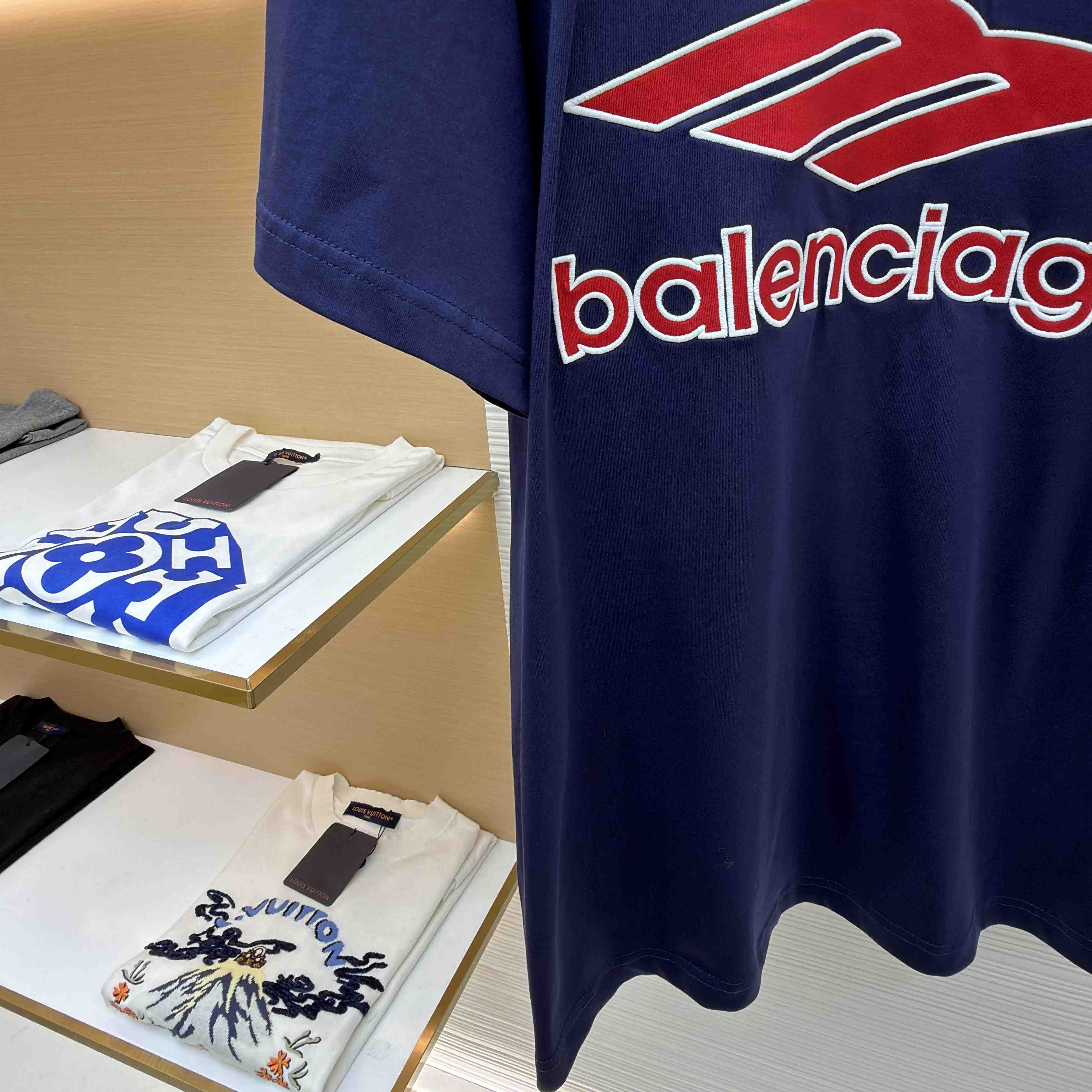 Balenciaga B Football V-Neck T-Shirt Oversized In Dark Navy - FashionPlug
